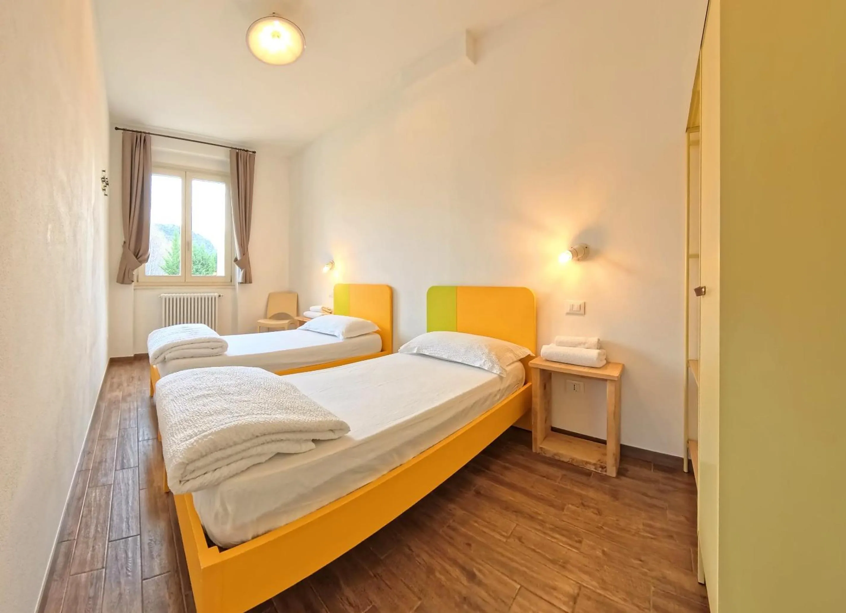 Bed in Oasi Da Vinci Apartments Lake Garda View