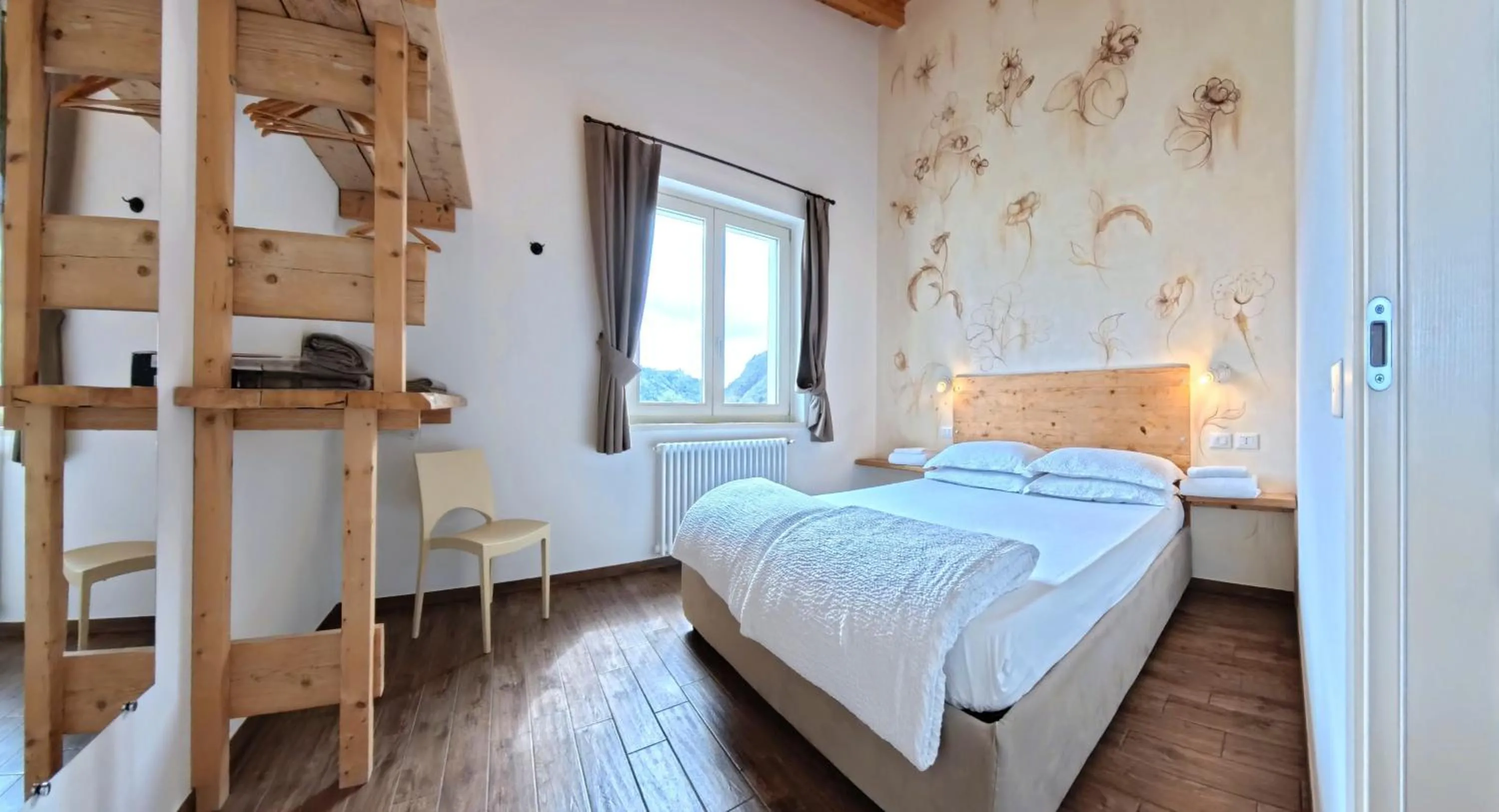 Bed in Oasi Da Vinci Apartments Lake Garda View