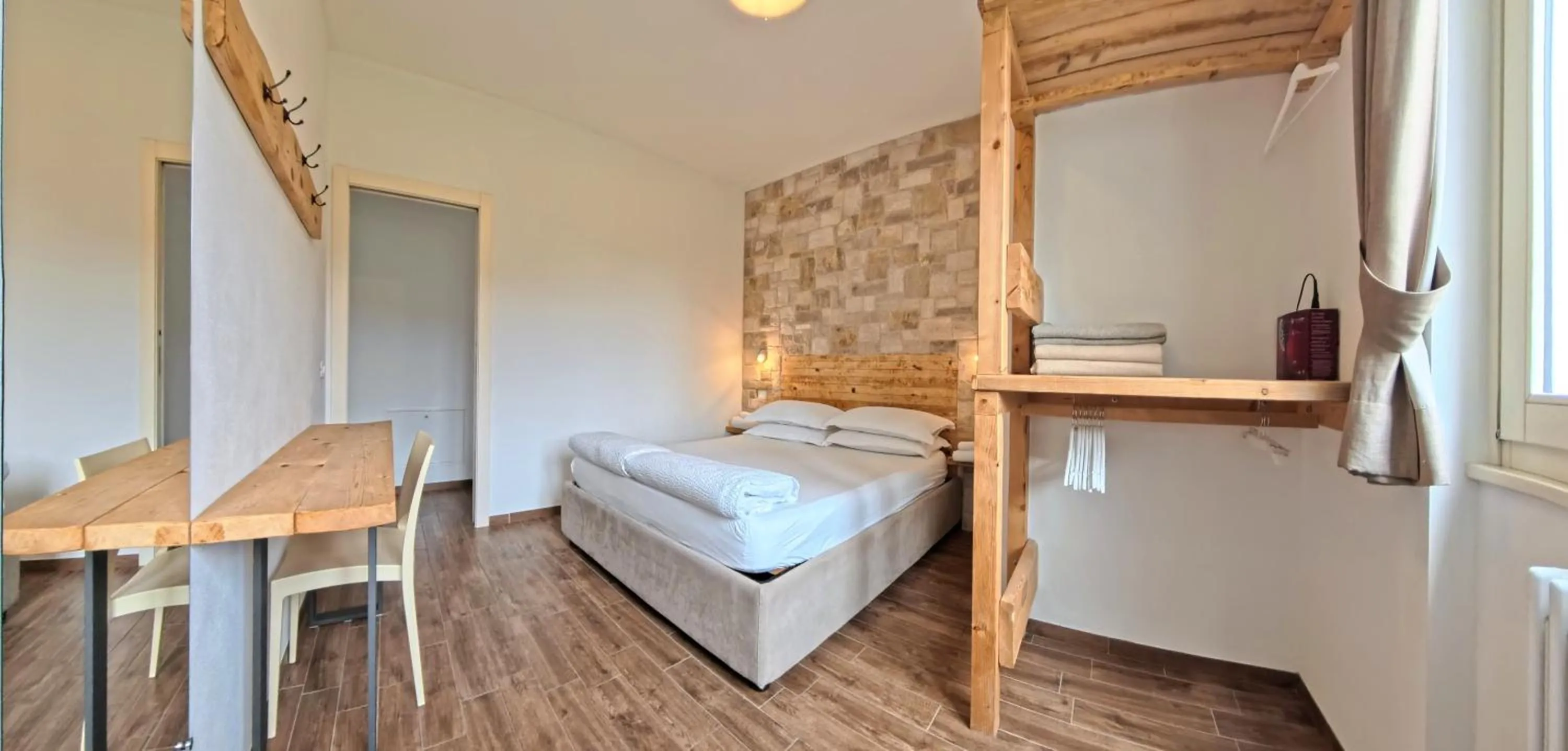Bed in Oasi Da Vinci Apartments Lake Garda View