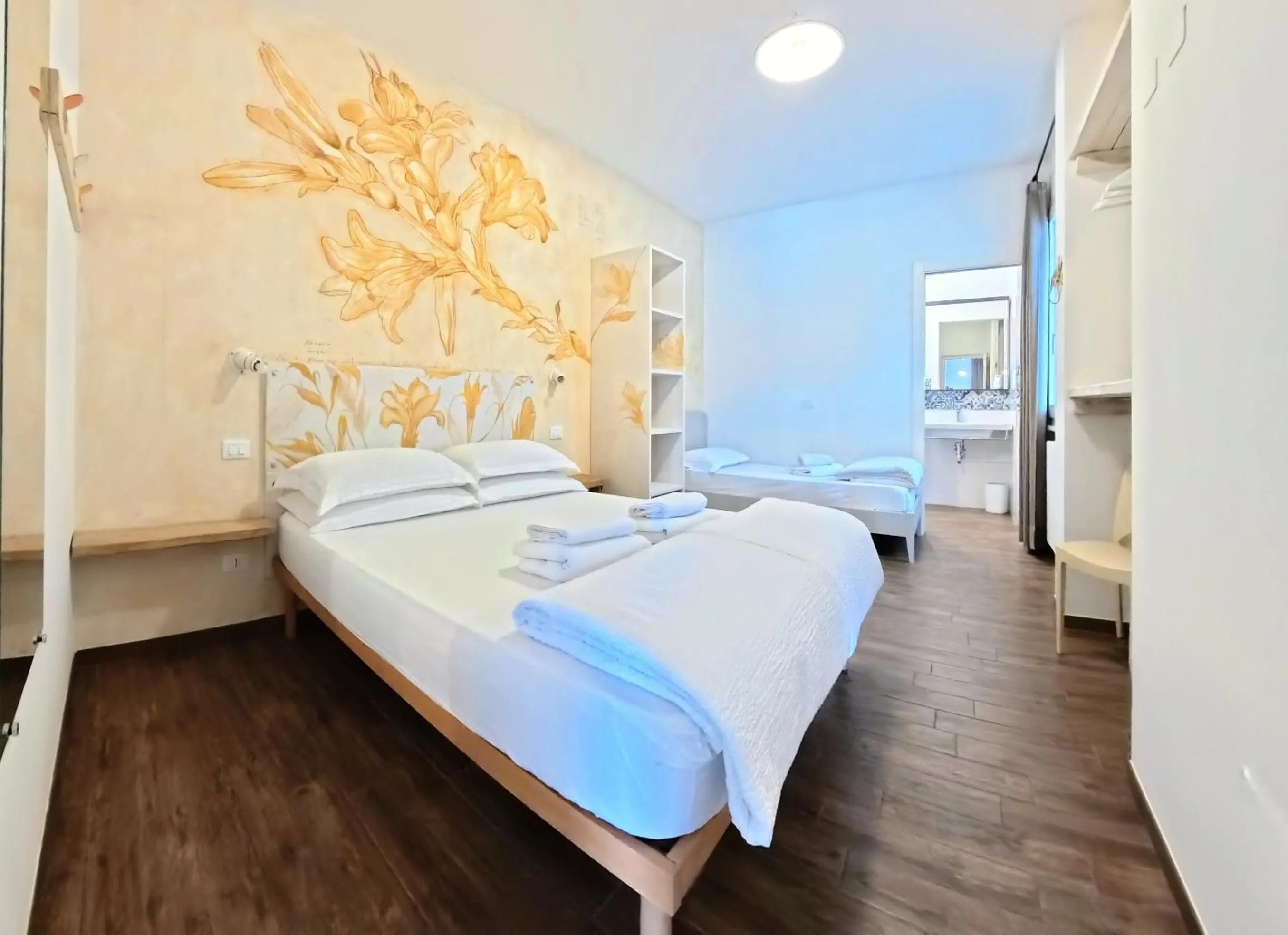 Bed in Oasi Da Vinci Apartments Lake Garda View