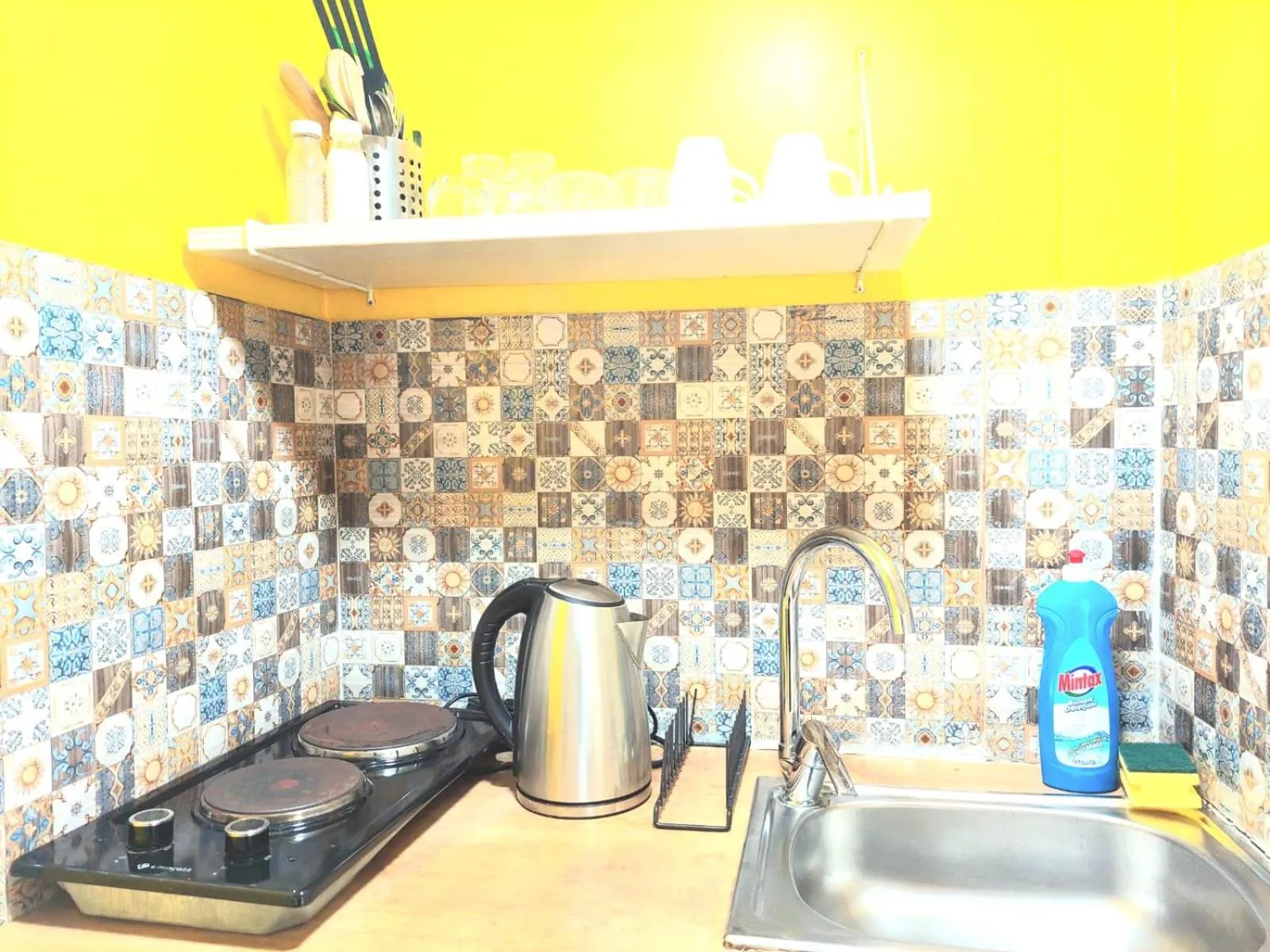 Kitchen or kitchenette in La bella hotel