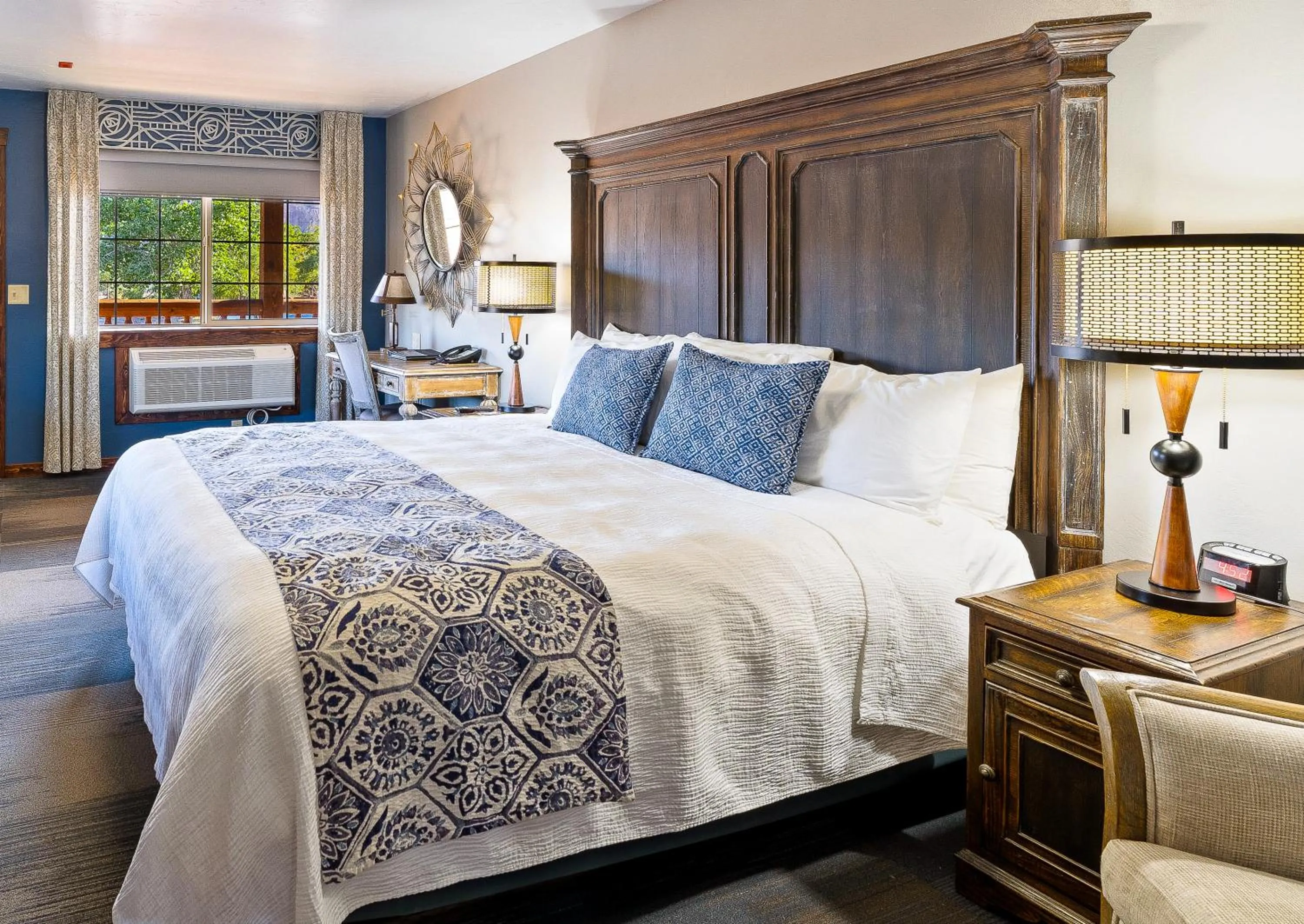 Bed in Desert Rose Resort & Cabins