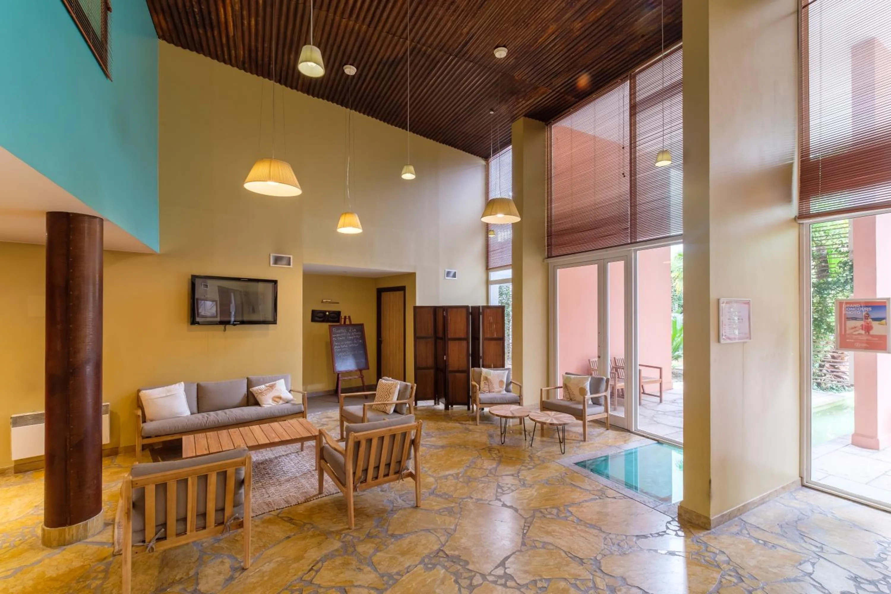 Communal lounge/ TV room in Résidence Pierre & Vacances Premium Port Prestige