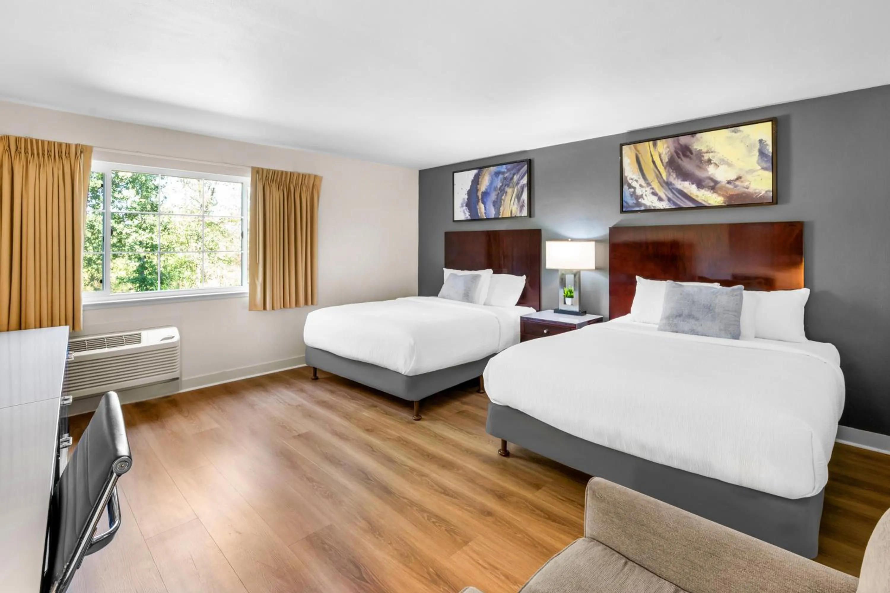 Bed in Quality Inn & Suites