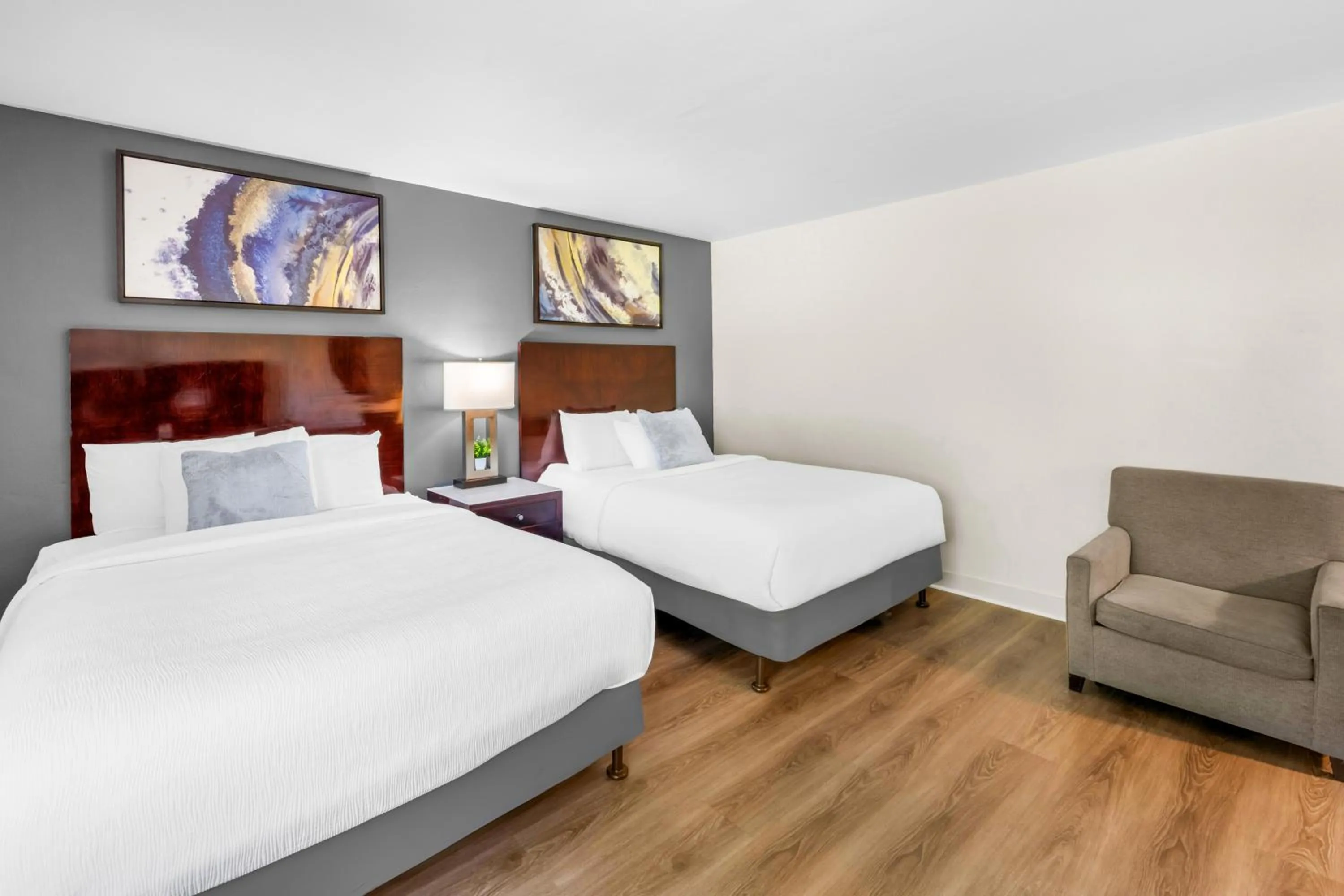 Bed in Quality Inn & Suites