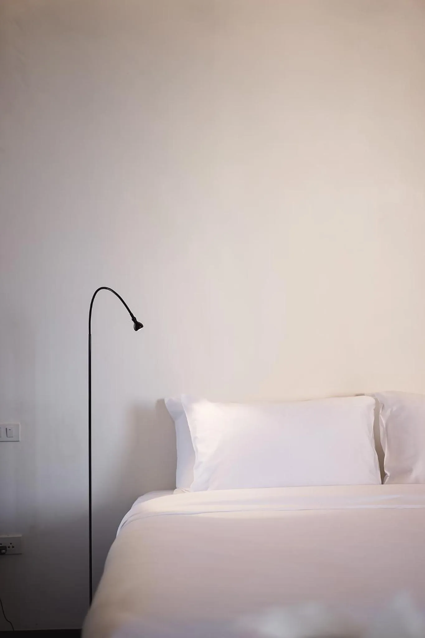 Bed in Wonderwall Hotel