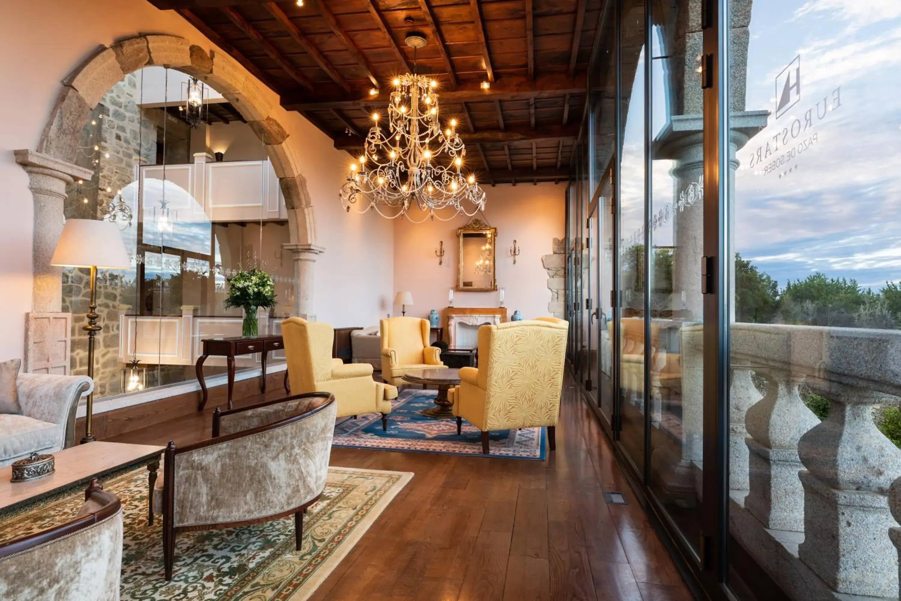 Living room in Áurea Palacio de Sober by Eurostars Hotel Company Living room in Áurea Palacio de Sober by Eurostars Hotel Company