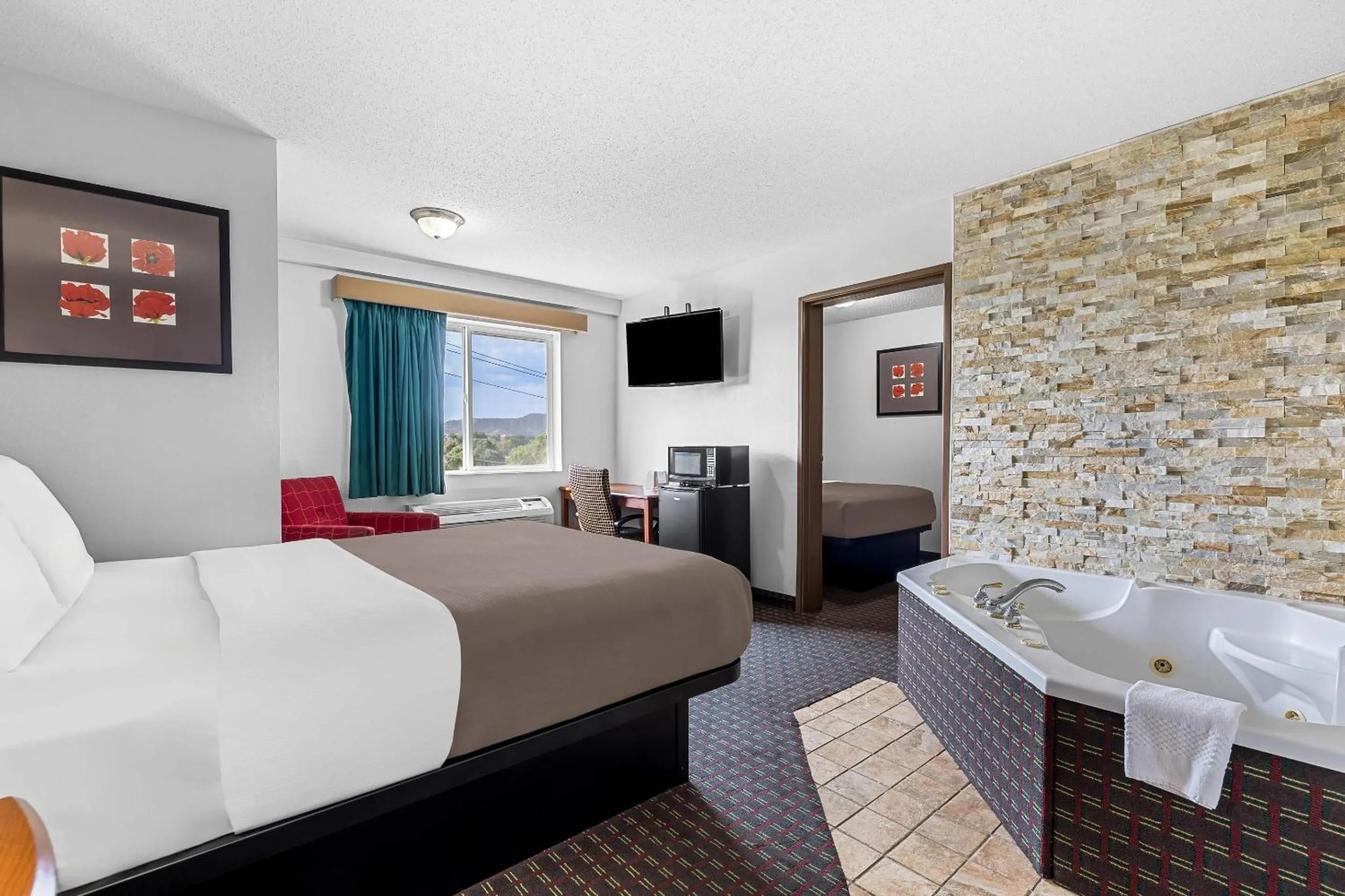 Bedroom, Bed in Rodeway Inn Rapid City North