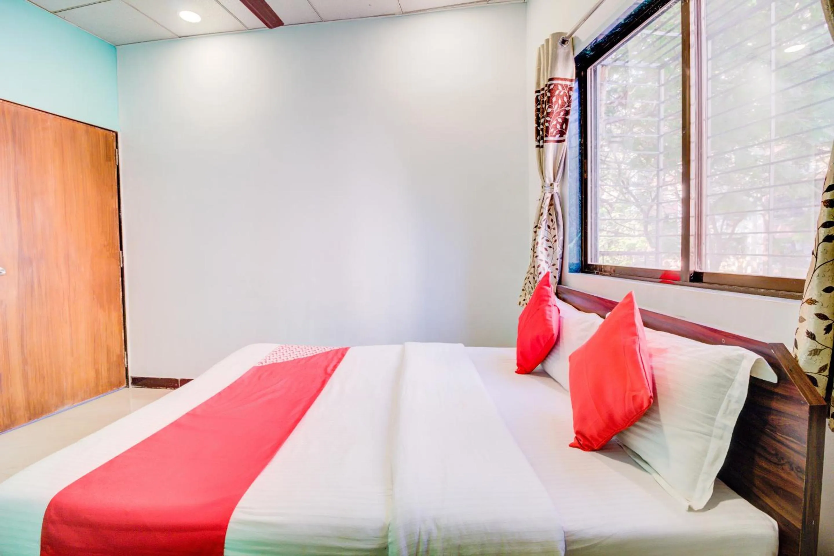 Bedroom, Bed in Super Hotel O Anjali Hotel