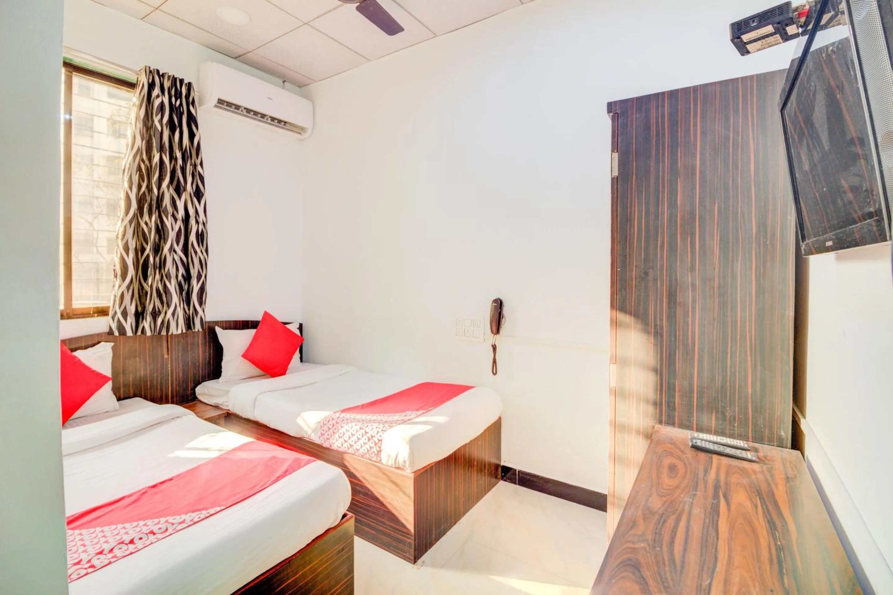 Bedroom, Bed in Super Hotel O Anjali Hotel