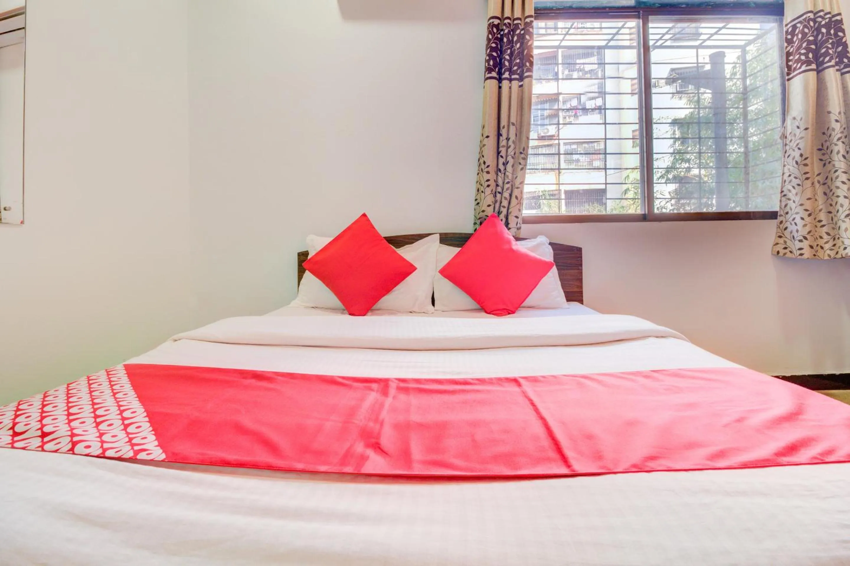 Bedroom, Bed in Super Hotel O Anjali Hotel