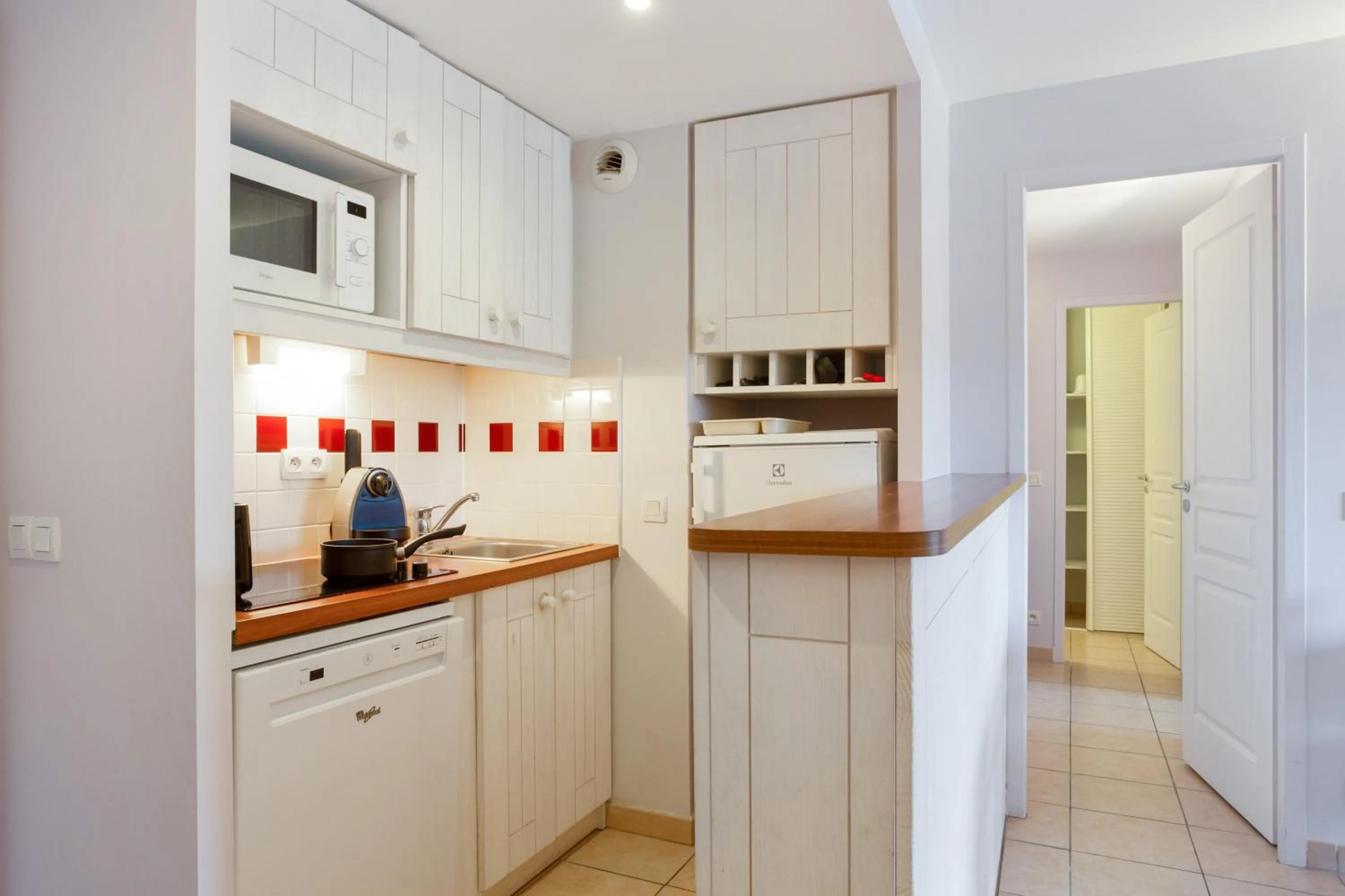 Kitchen or kitchenette in Village Pierre & Vacances Moliets