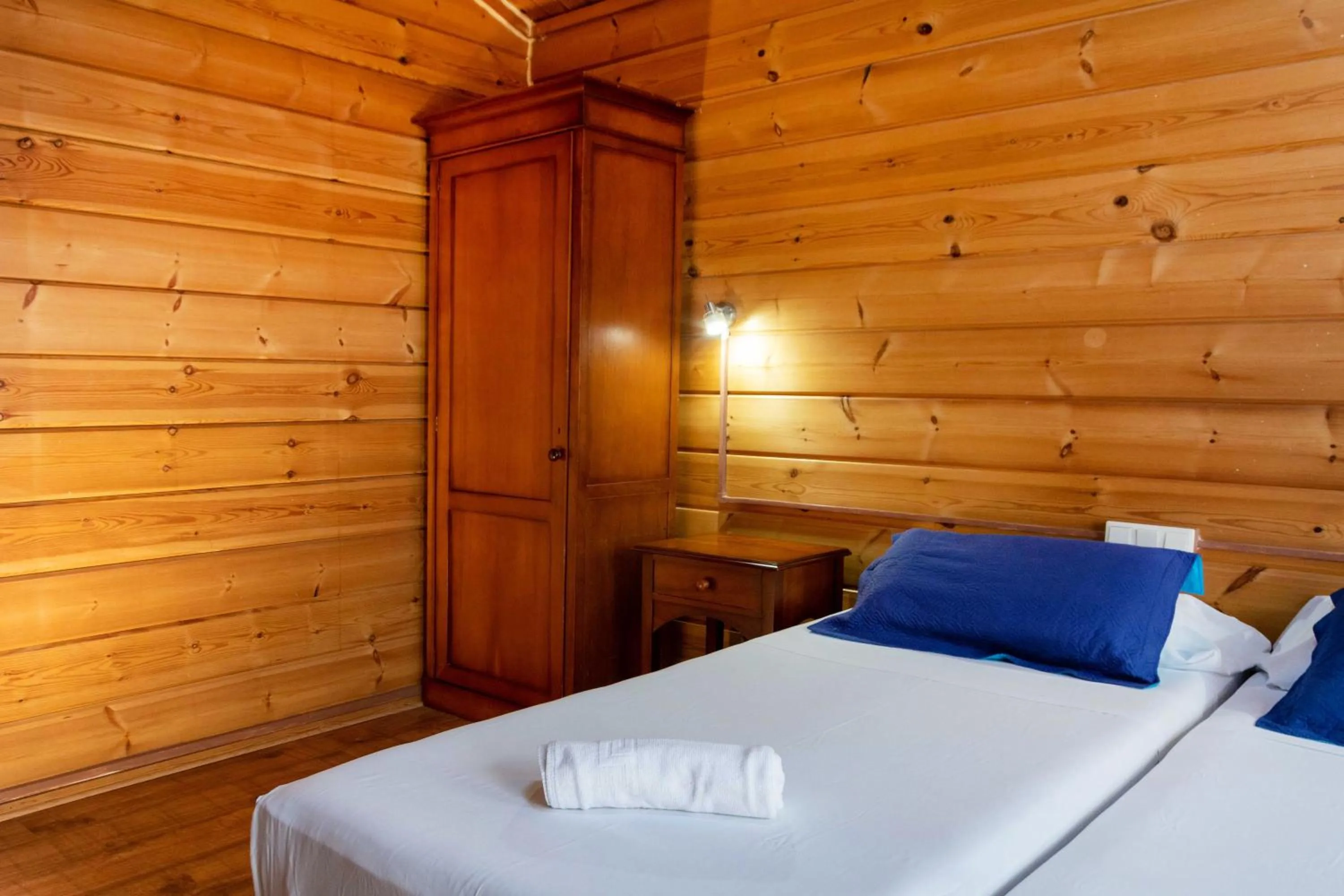 Bed in APARTAMENTOS PALASIET