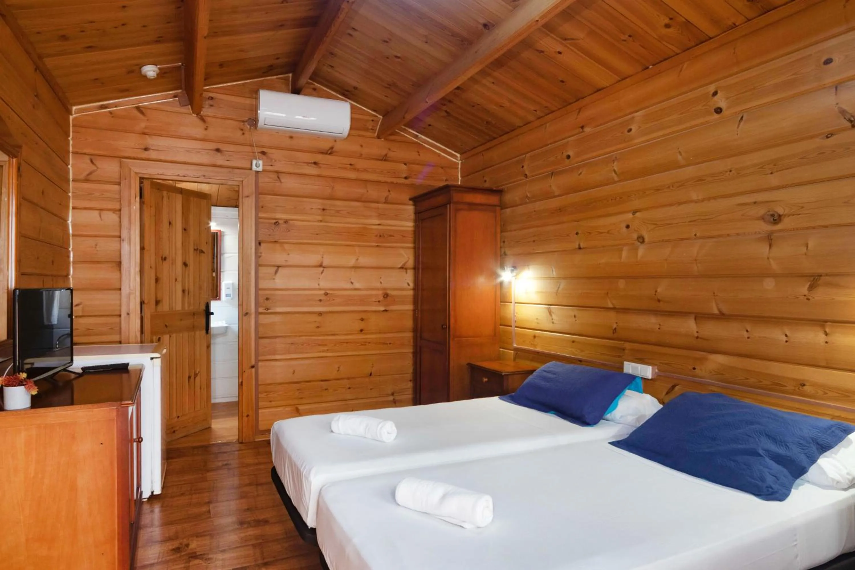 Bed in APARTAMENTOS PALASIET