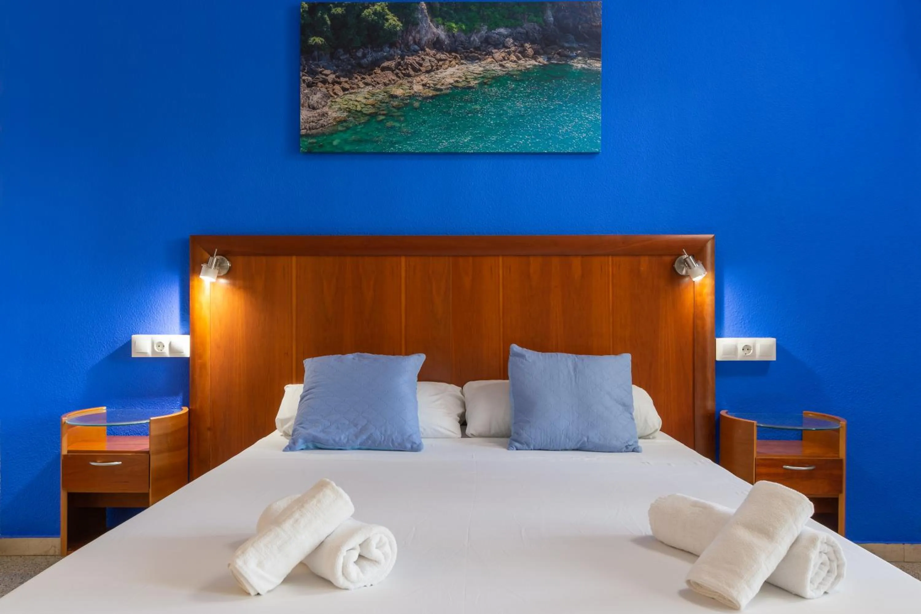 Bed in APARTAMENTOS PALASIET