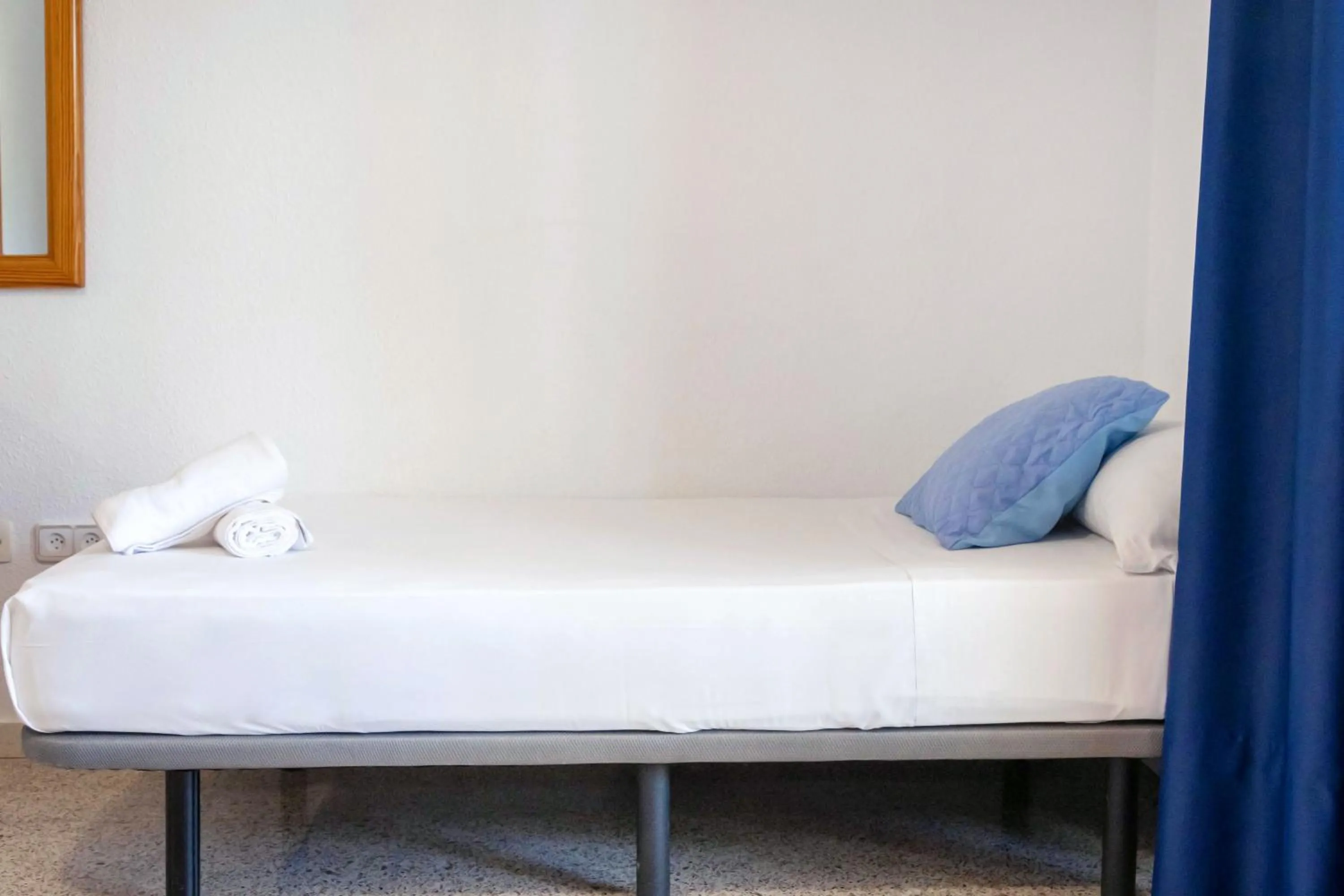 Bed in APARTAMENTOS PALASIET