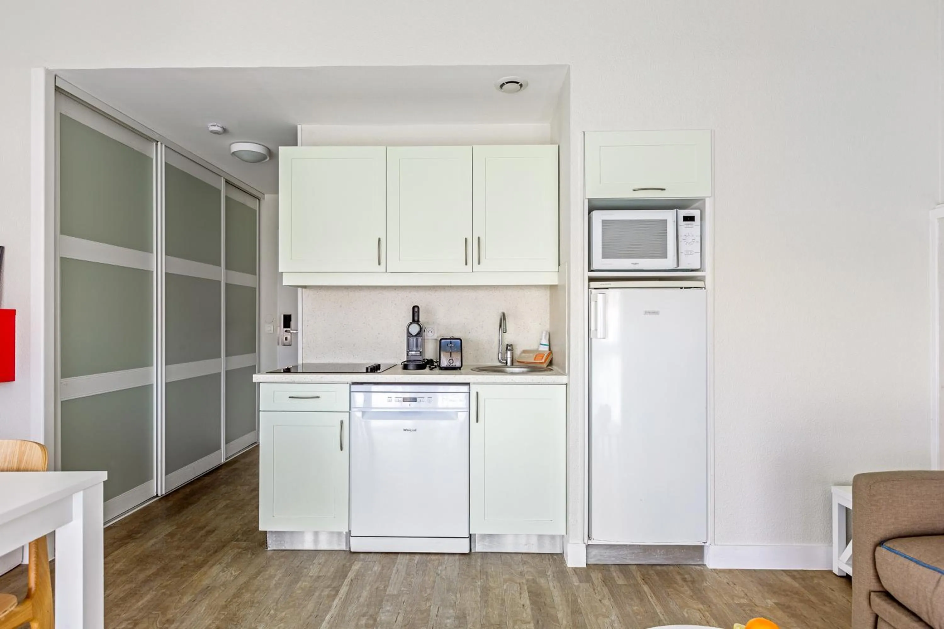 Kitchen or kitchenette in Résidence Pierre & Vacances Le Palais des Gouverneurs