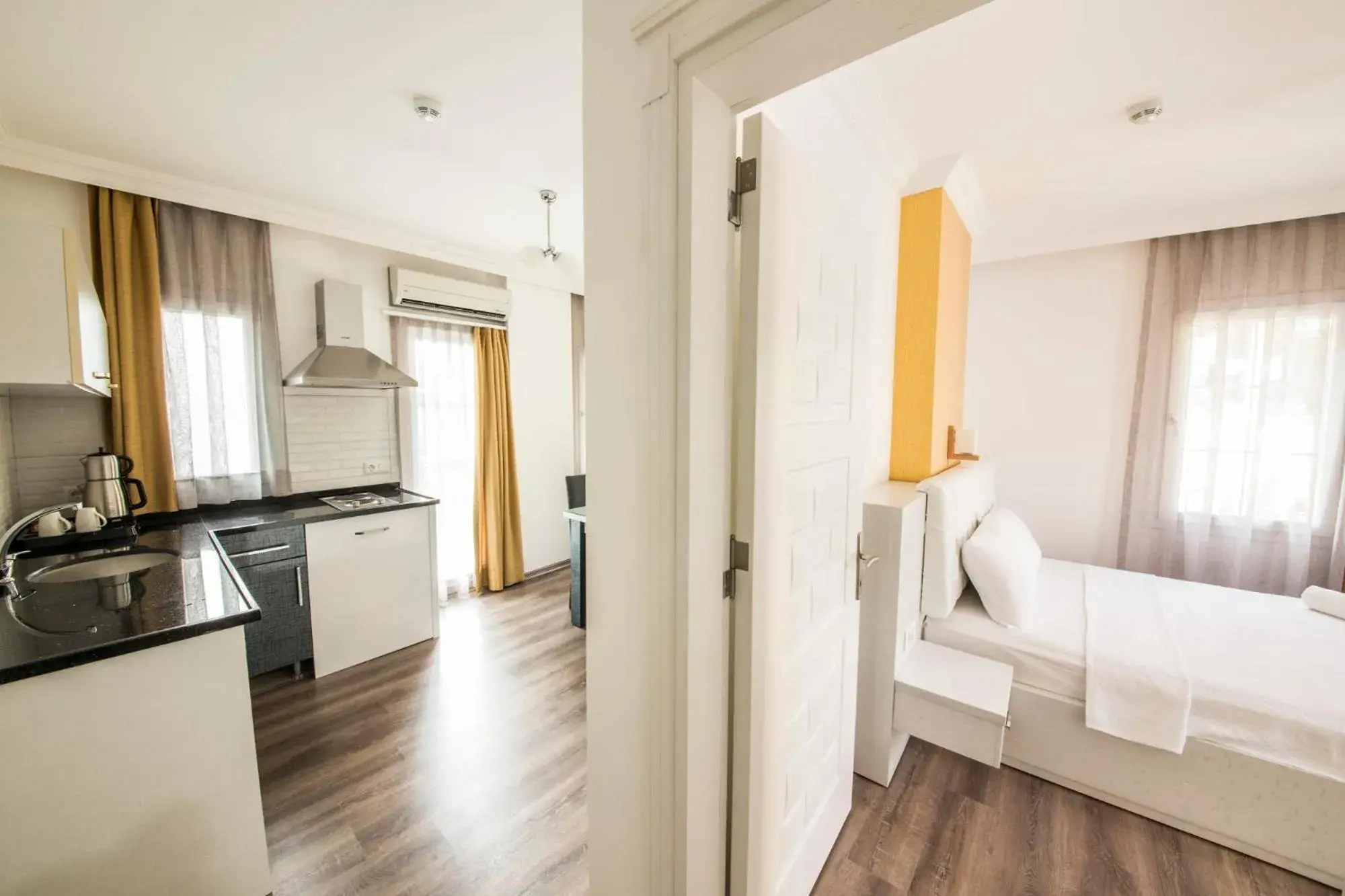 Kitchen or kitchenette, Bed in dekatria rooms&aparts Kitchen or kitchenette, Bed in dekatria rooms&aparts