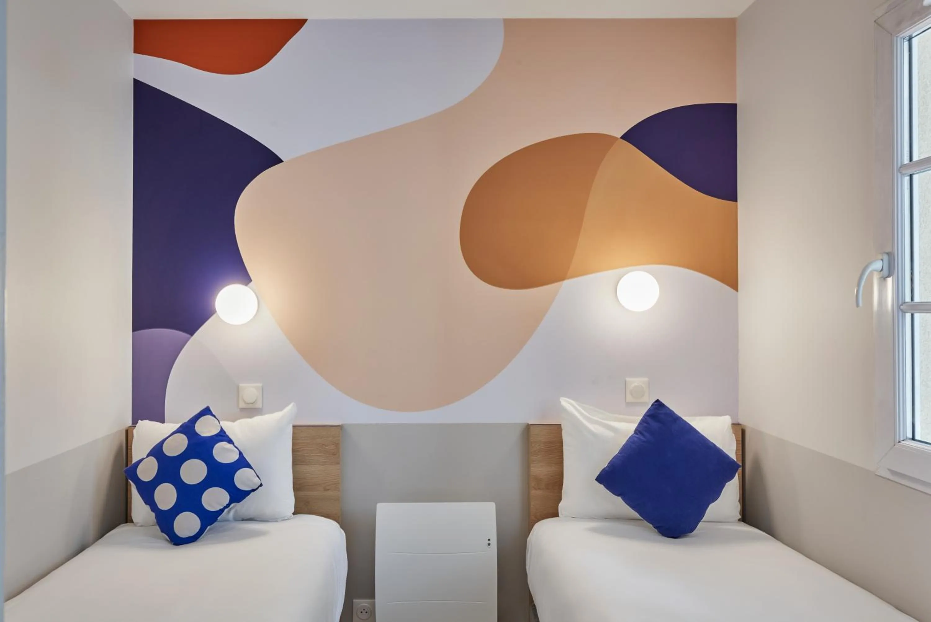 Bed in Aparthotel Adagio Val d'Europe près de Disneyland Paris