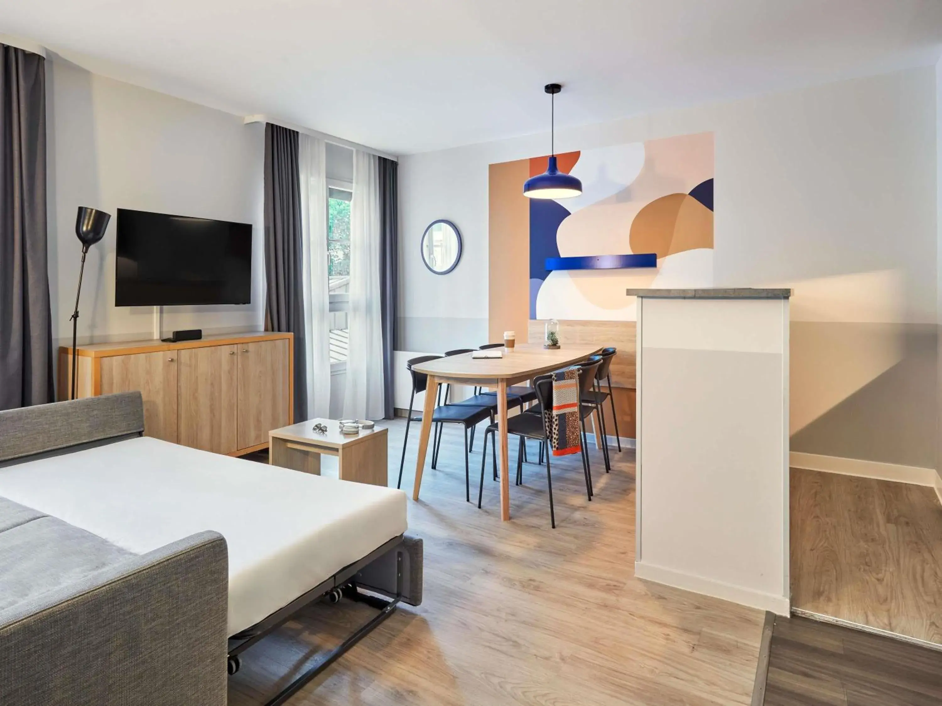 Bedroom in Aparthotel Adagio Val d'Europe près de Disneyland Paris Bedroom in Aparthotel Adagio Val d'Europe près de Disneyland Paris