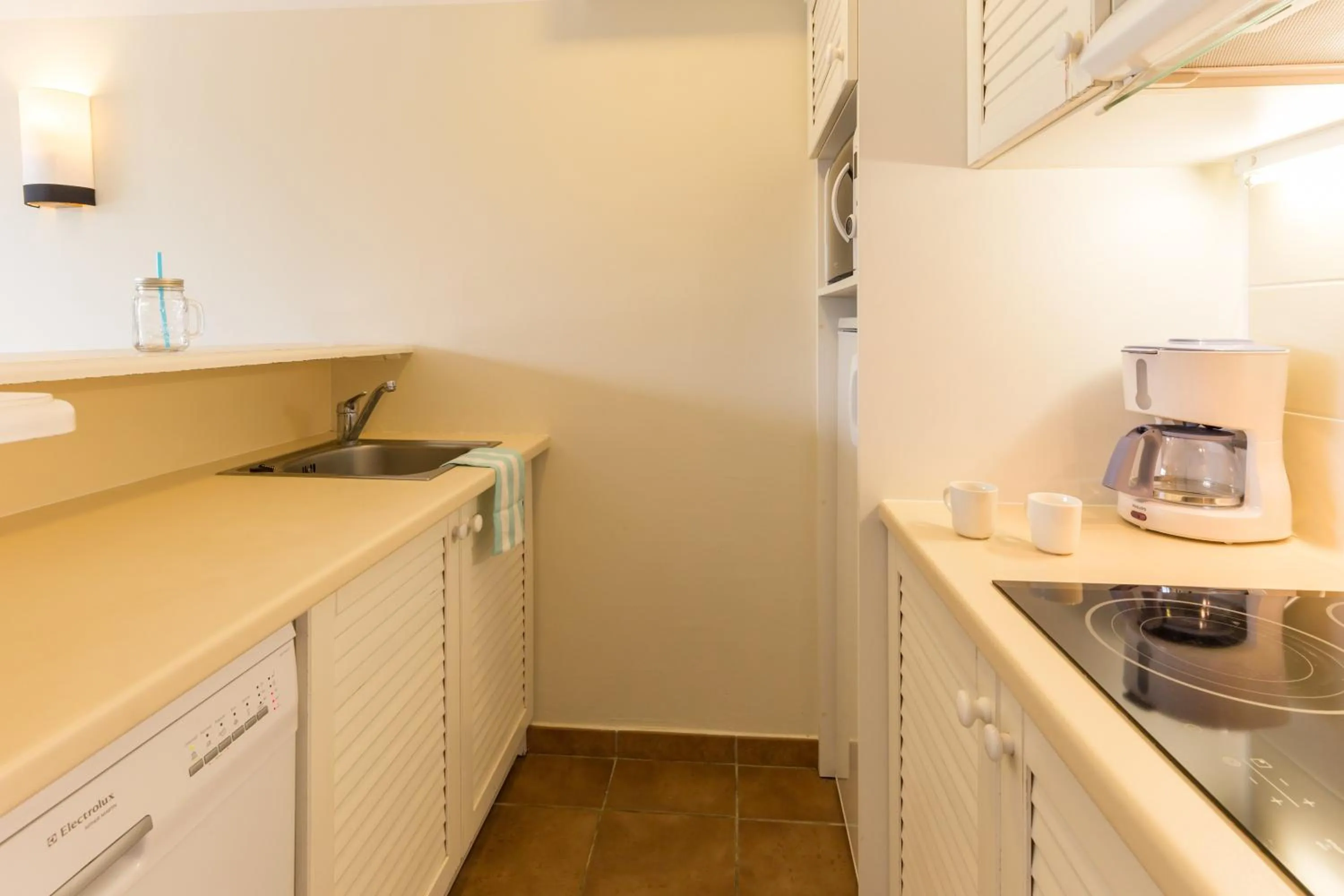 Kitchen or kitchenette in Village Pierre & Vacances Normandy Garden