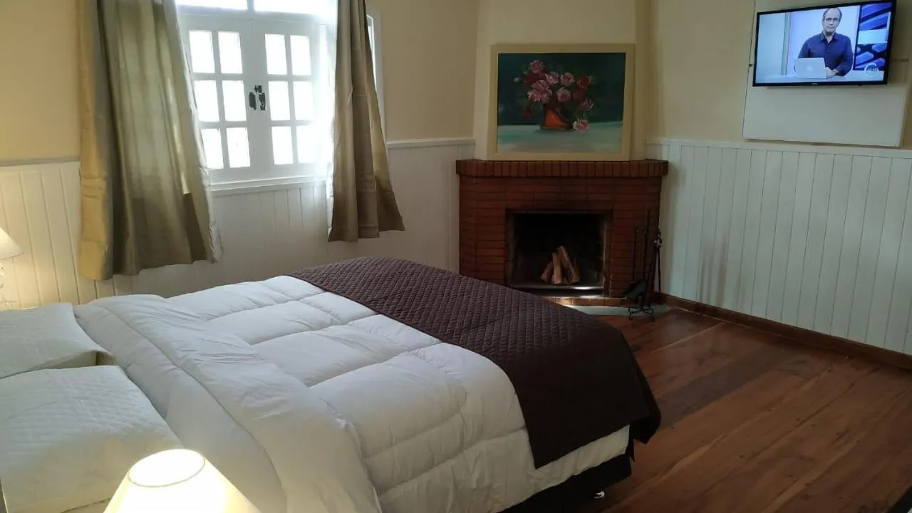 Bed in Pousada Refúgio das Rosas - Campos do Jordão