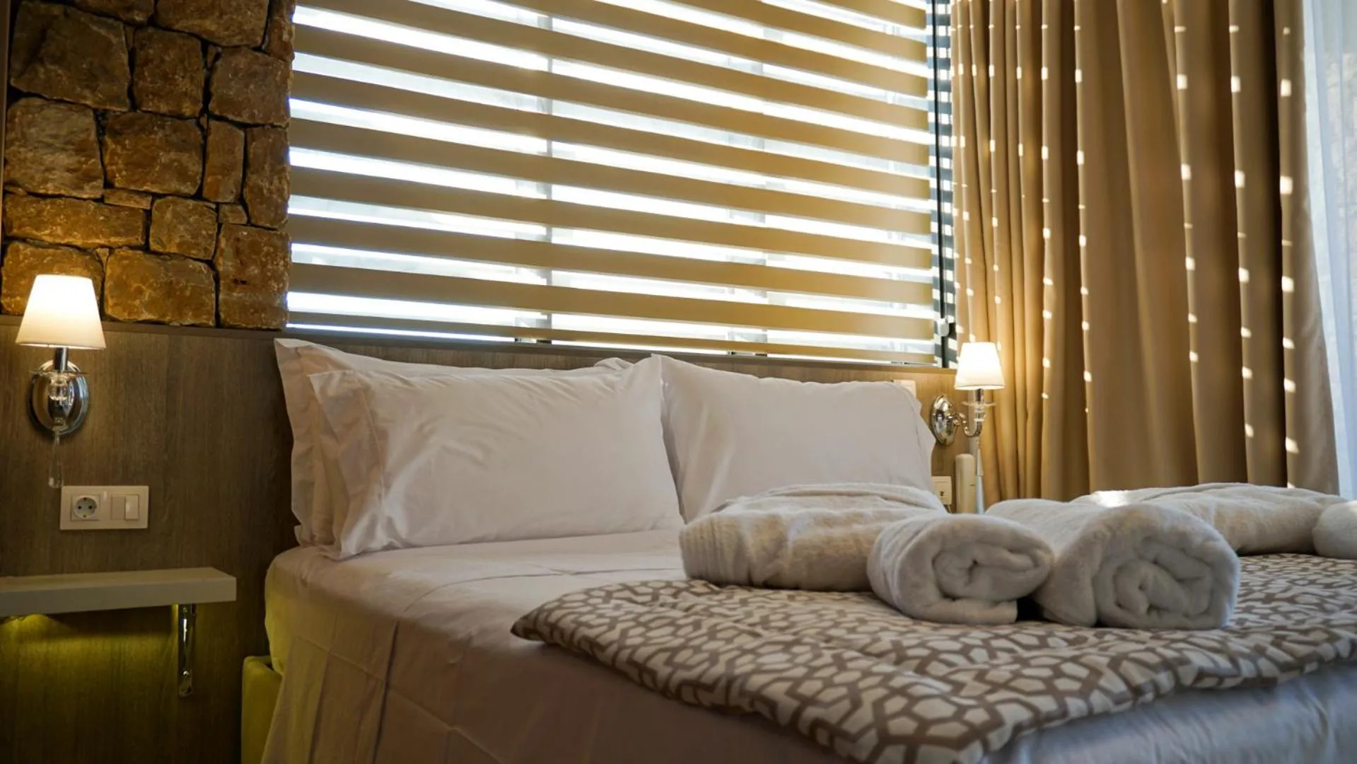 Bed in Agnes Deluxe Hotel