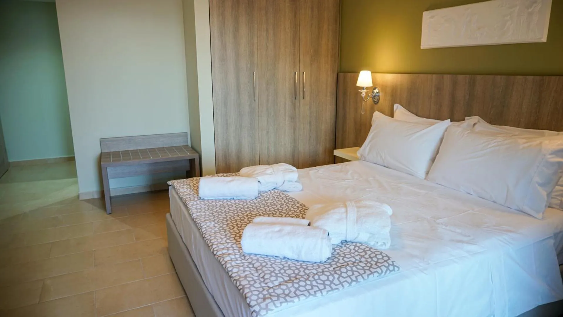 Bed in Agnes Deluxe Hotel
