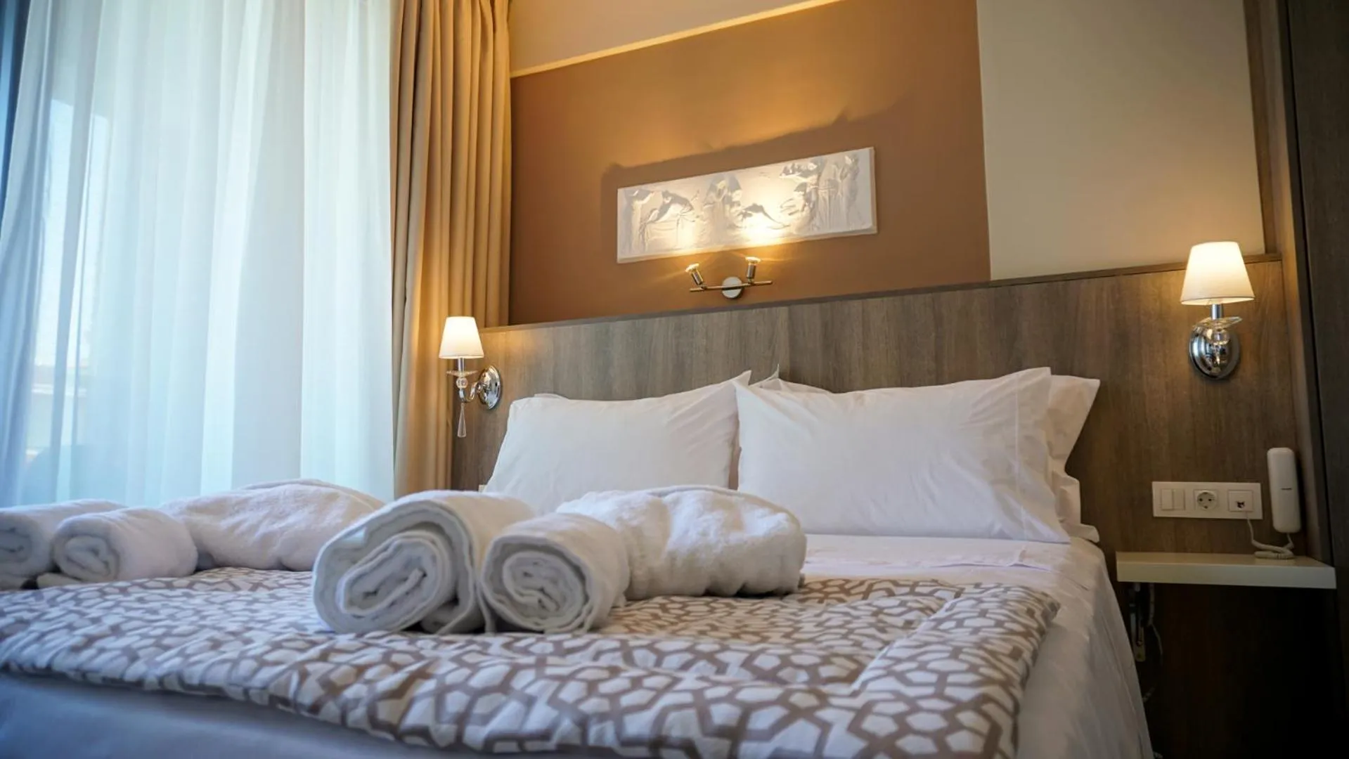 Bed in Agnes Deluxe Hotel