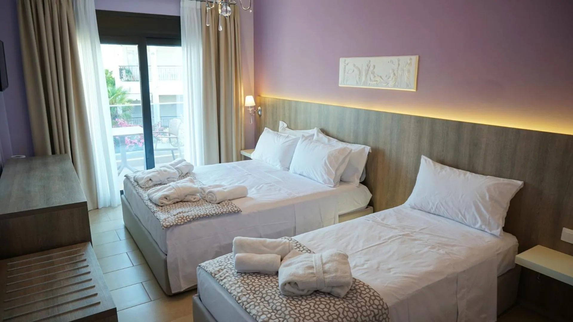 Bed in Agnes Deluxe Hotel