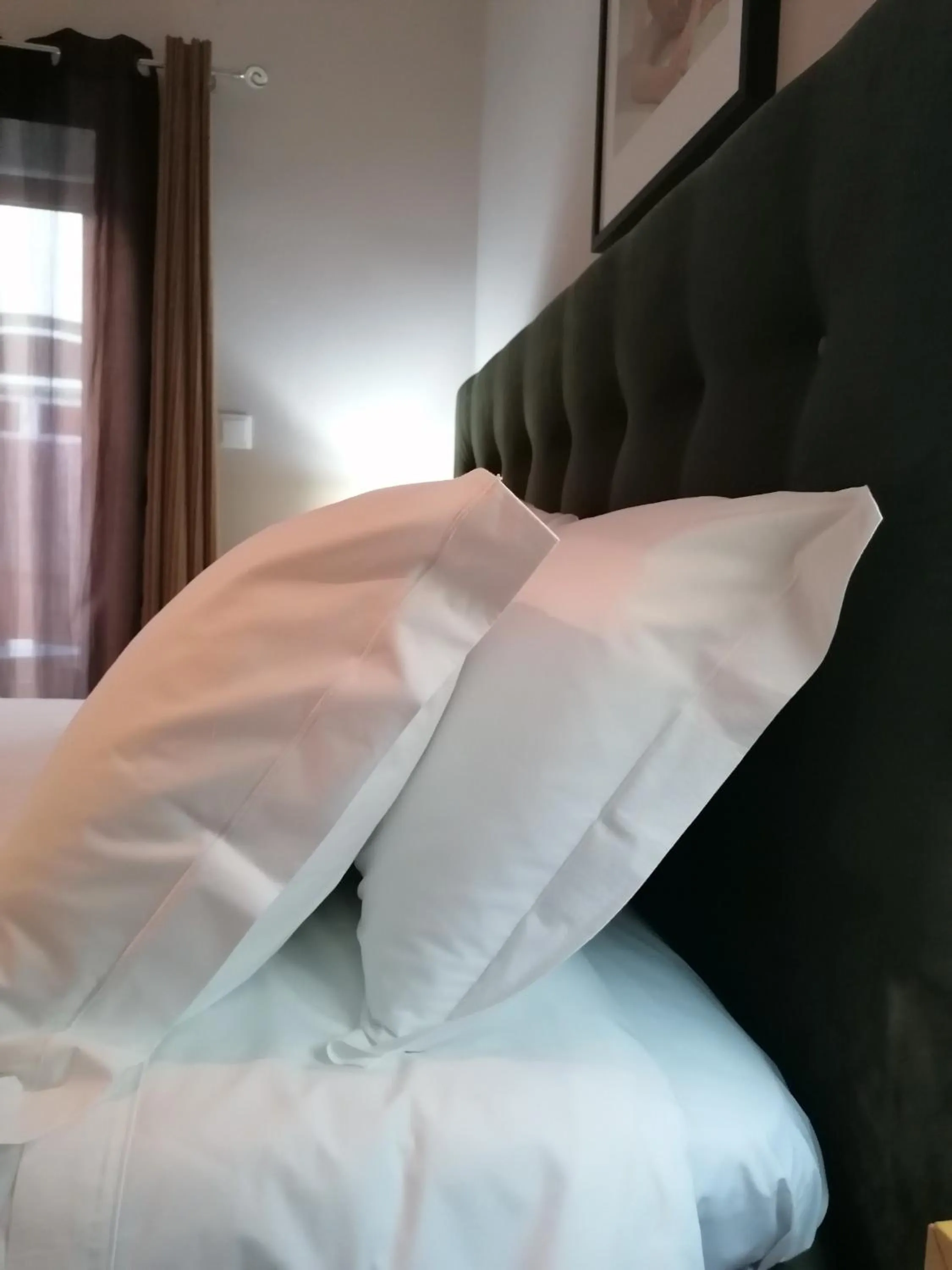 Bed in Temple Suites Guesthouse