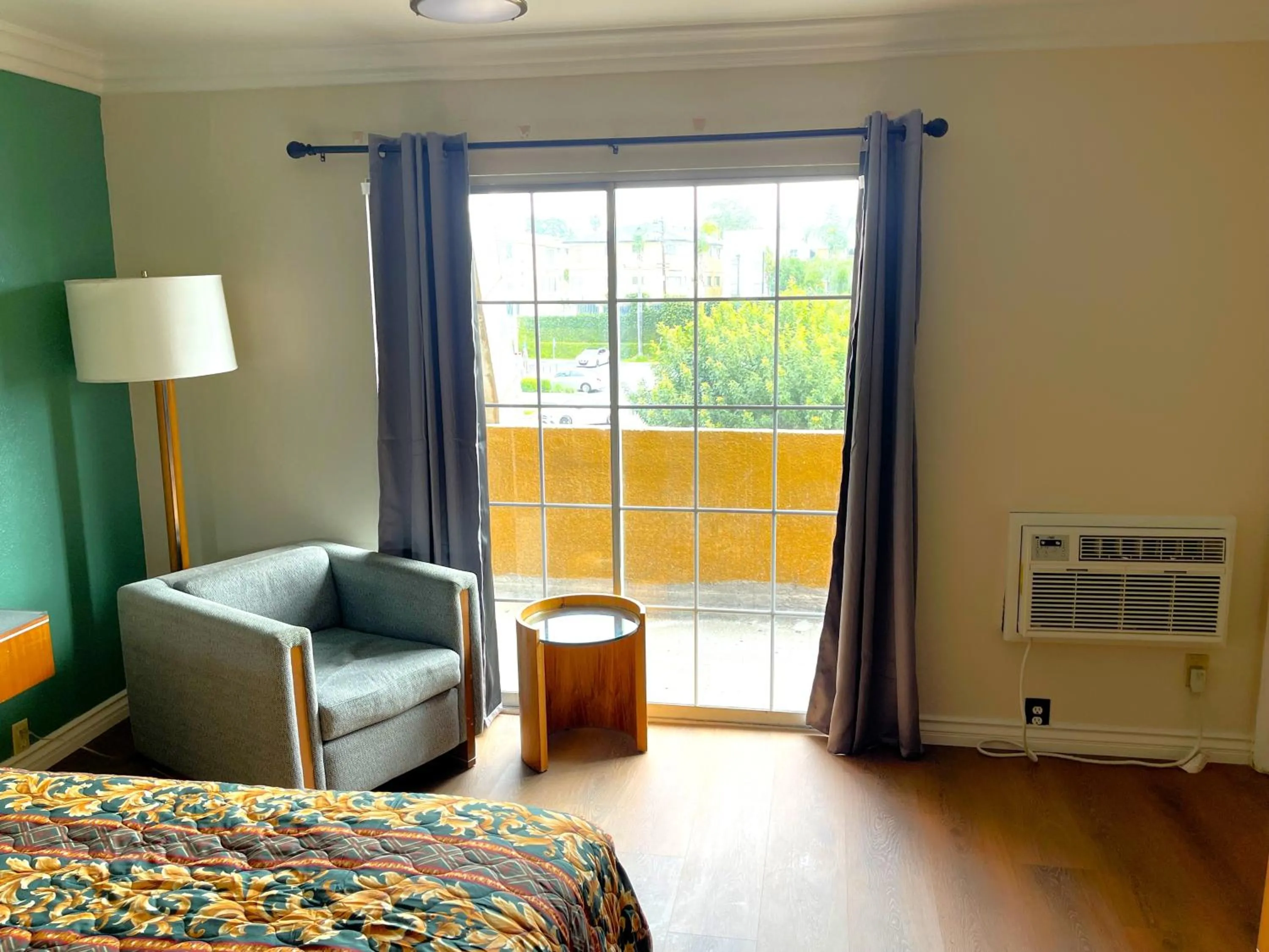 Seating area, Bed in Relax Inn