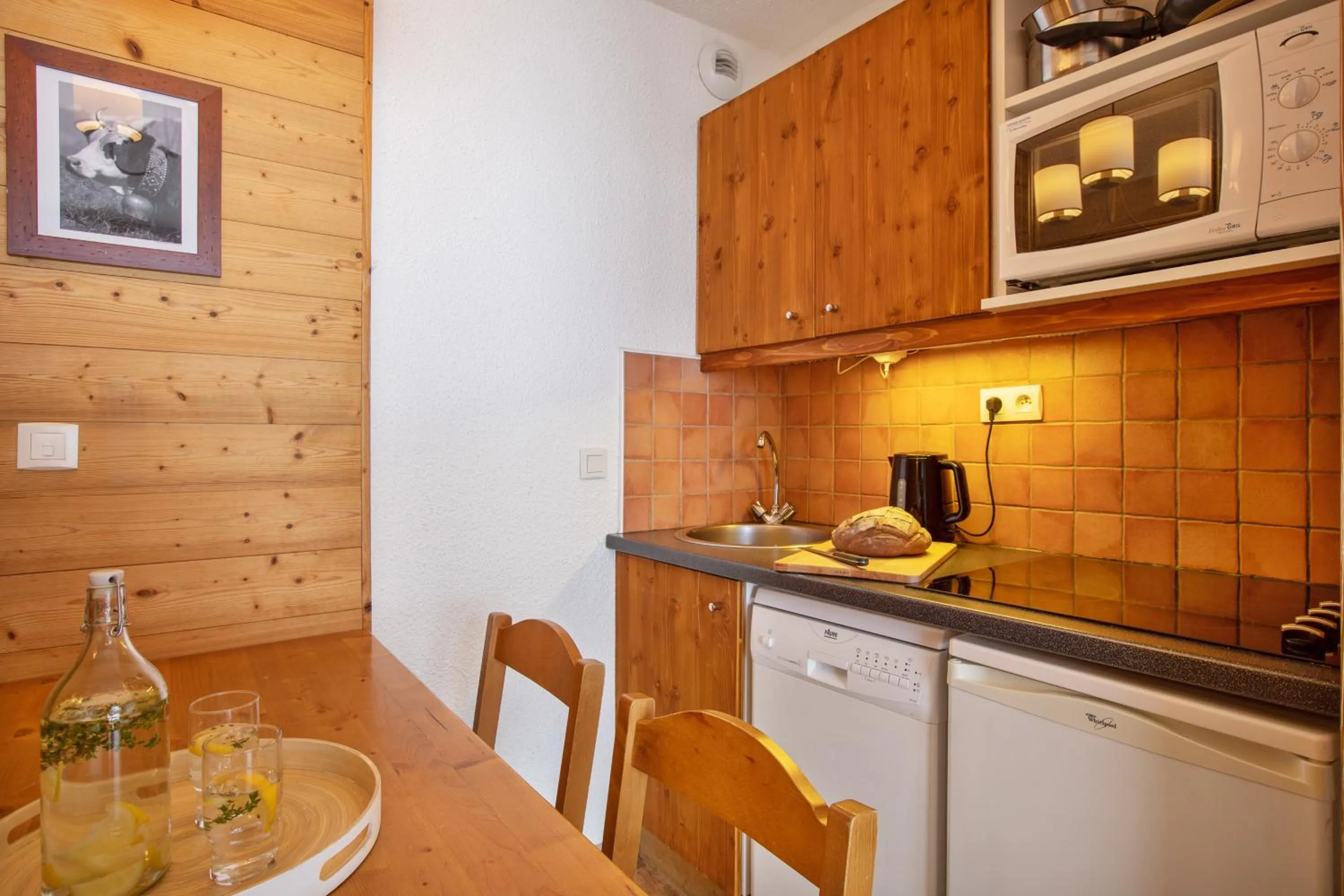 Kitchen or kitchenette in Résidence Pierre & Vacances Les Sentiers du Tueda