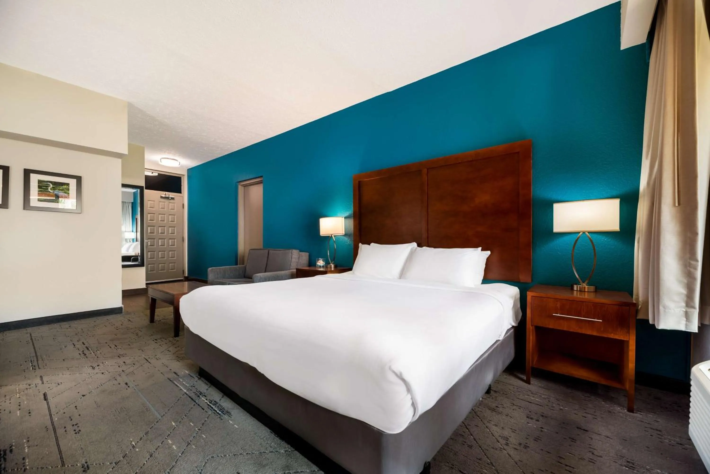 Bedroom, Bed in SureStay Plus Hotel by Best Western The Villages