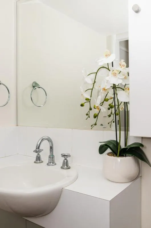 Bathroom in City Stadium Apartment on the riverfront