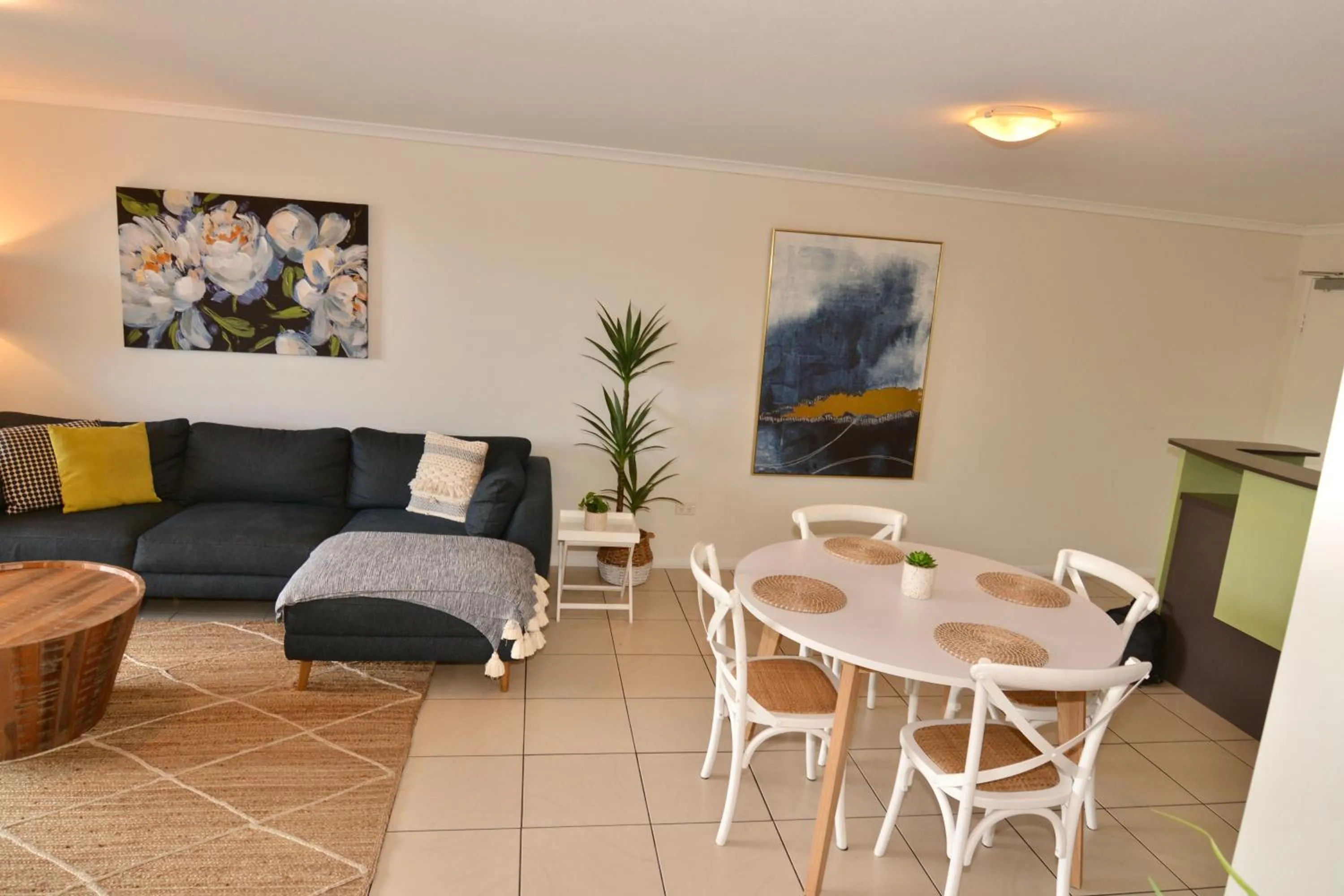 Dining area in City Stadium Apartment on the riverfront