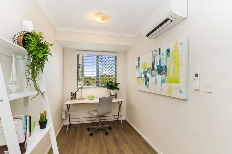 Seating area in City Stadium Apartment on the riverfront