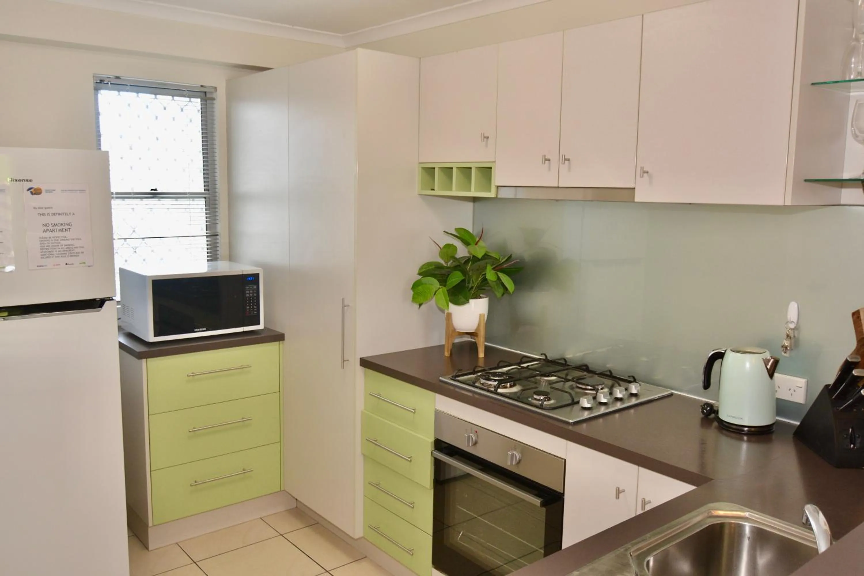 Kitchen or kitchenette in City Stadium Apartment on the riverfront