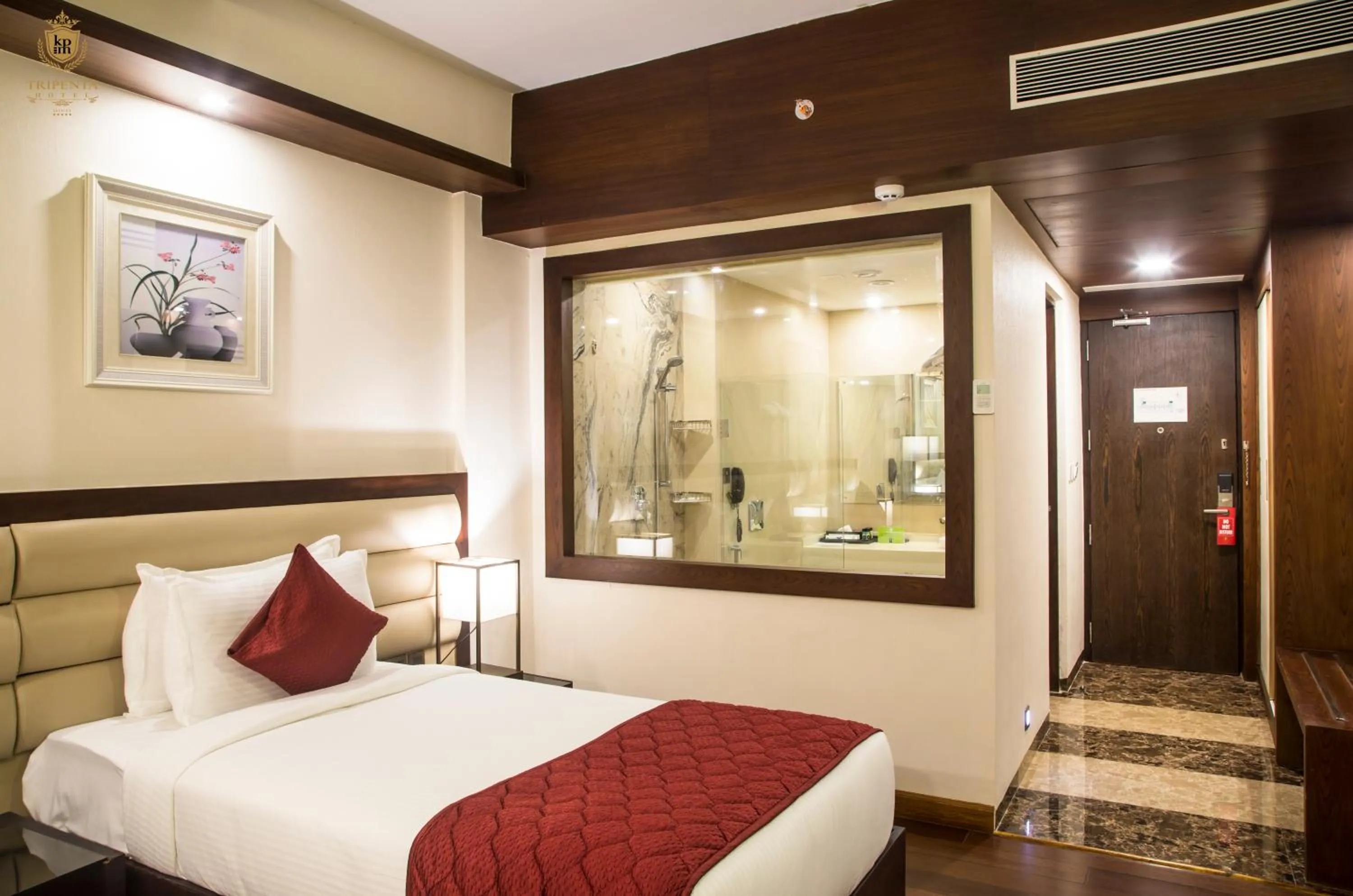 Bed in KPM TRIPENTA HOTEL