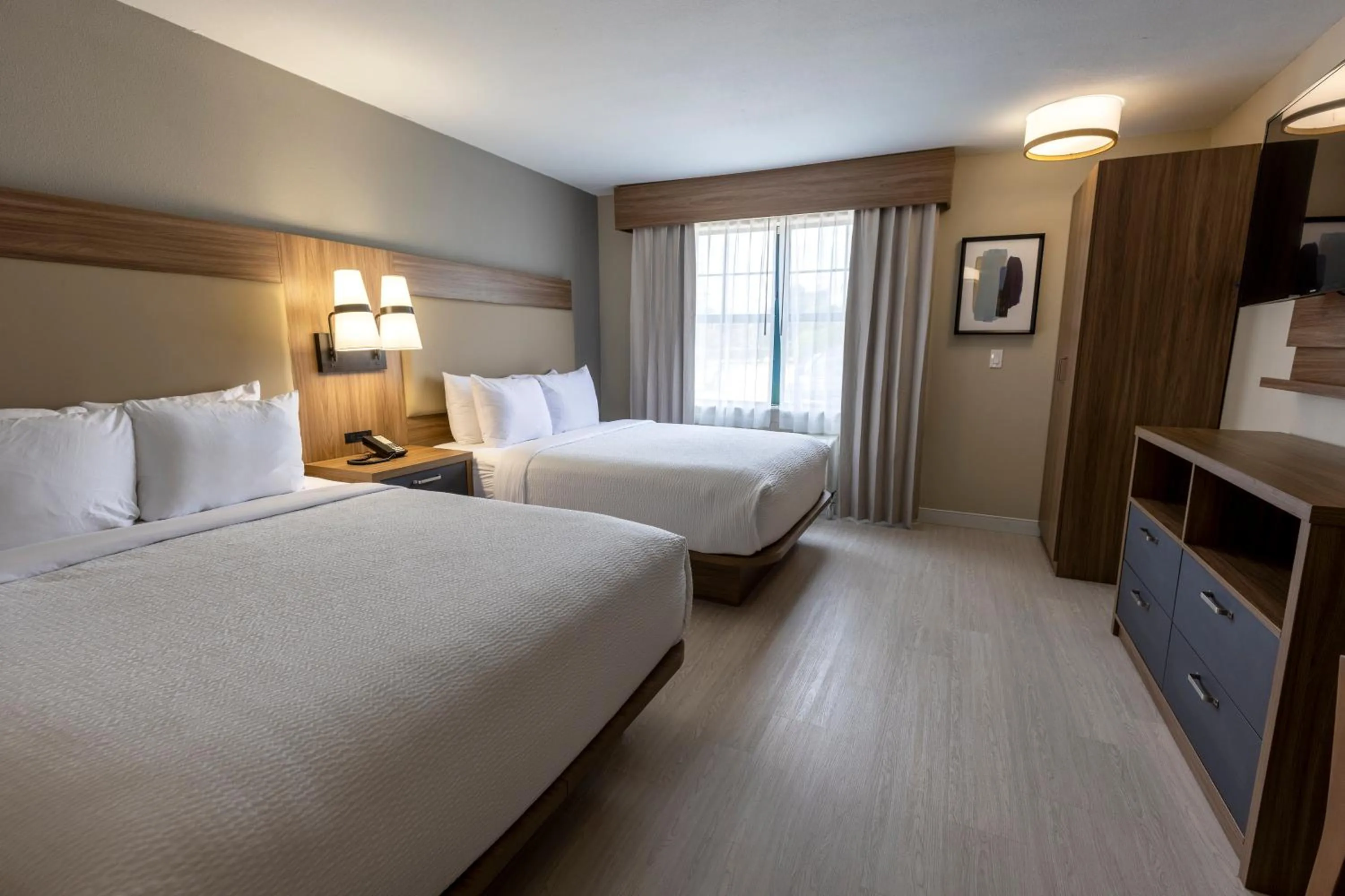 Bed in Sonesta ES Suites Lafayette Airport