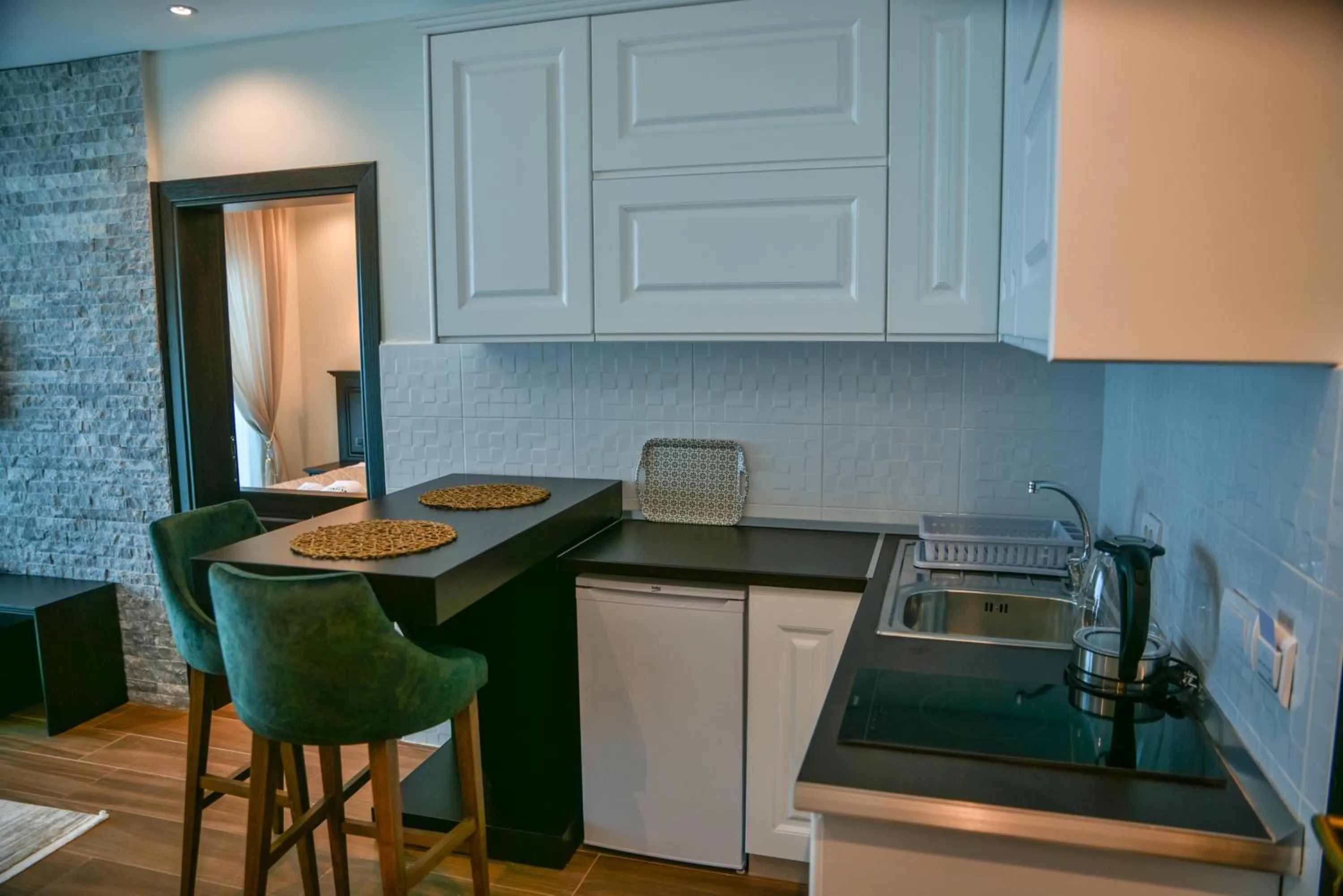 Kitchen or kitchenette in Padam Hotel & SPA