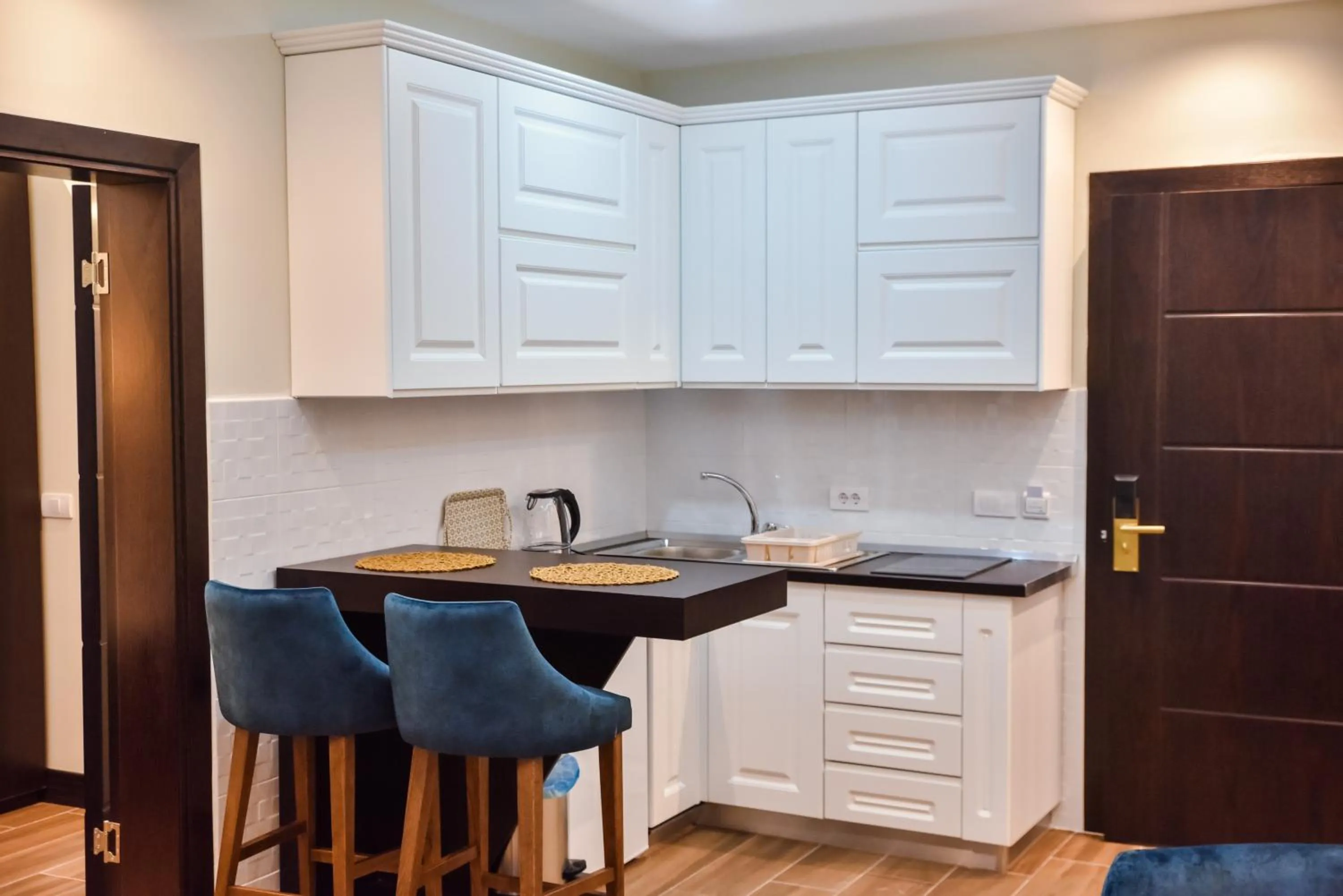 Kitchen or kitchenette in Padam Hotel & SPA