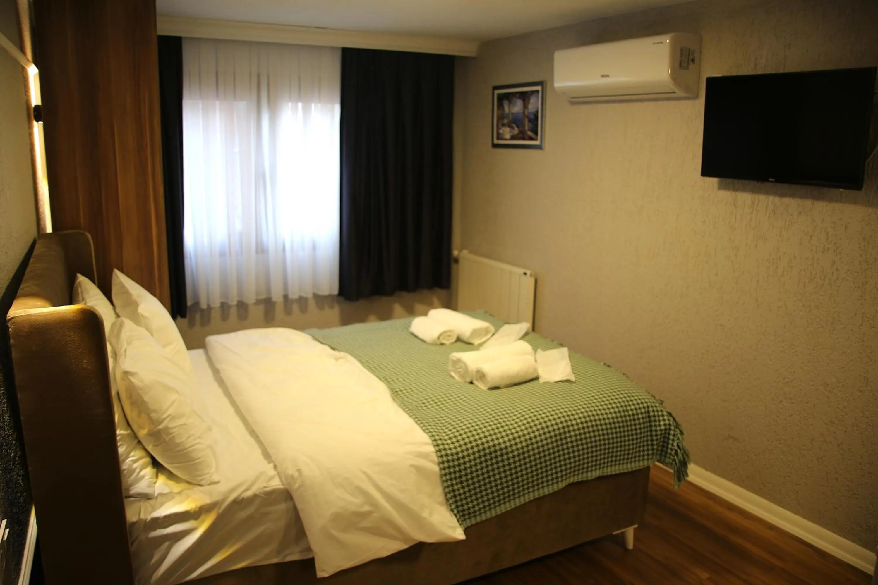 Bed in Sofia Corner Hotel