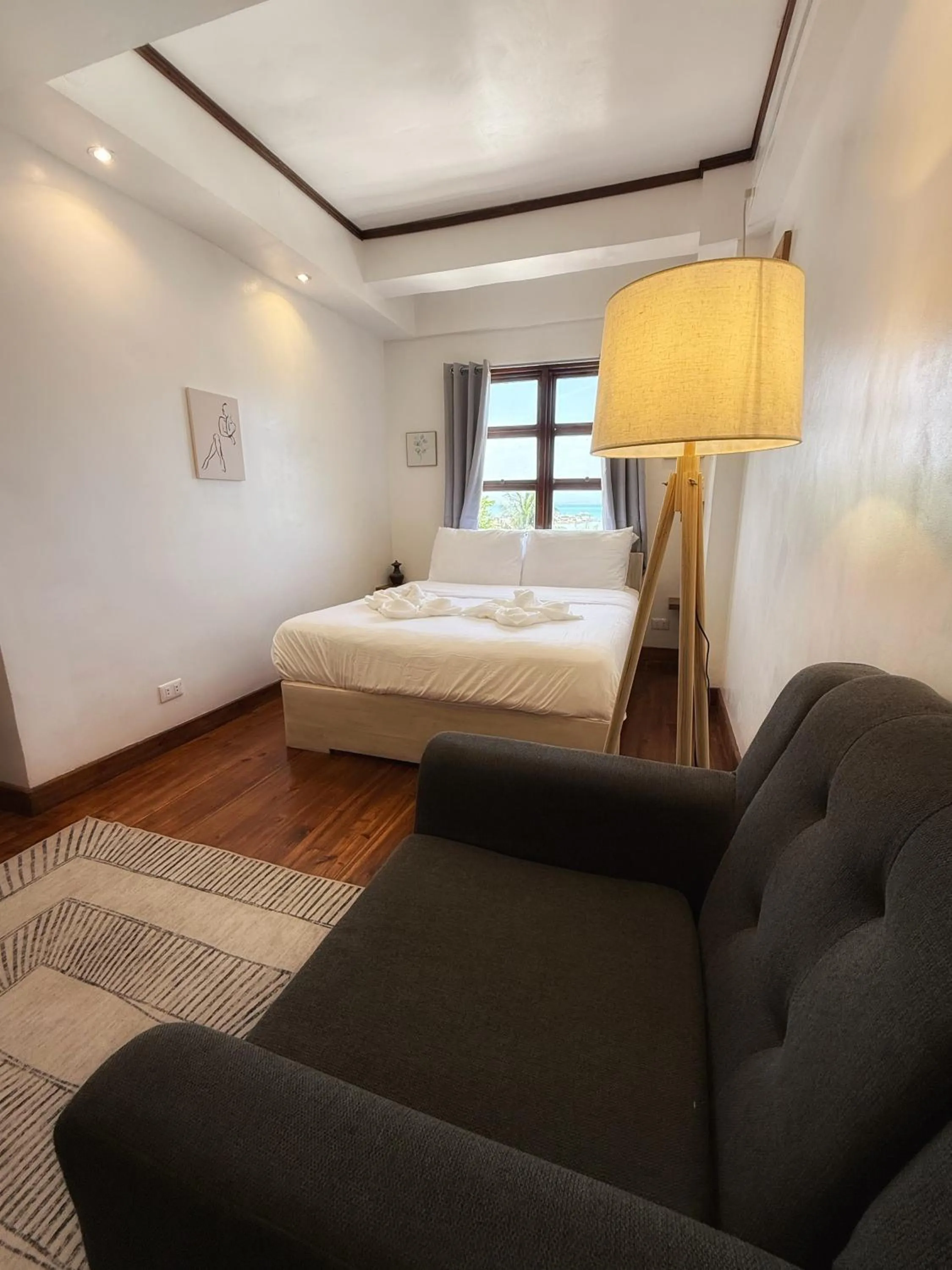 Photo of the whole room, Bed in Marina 4Rooms