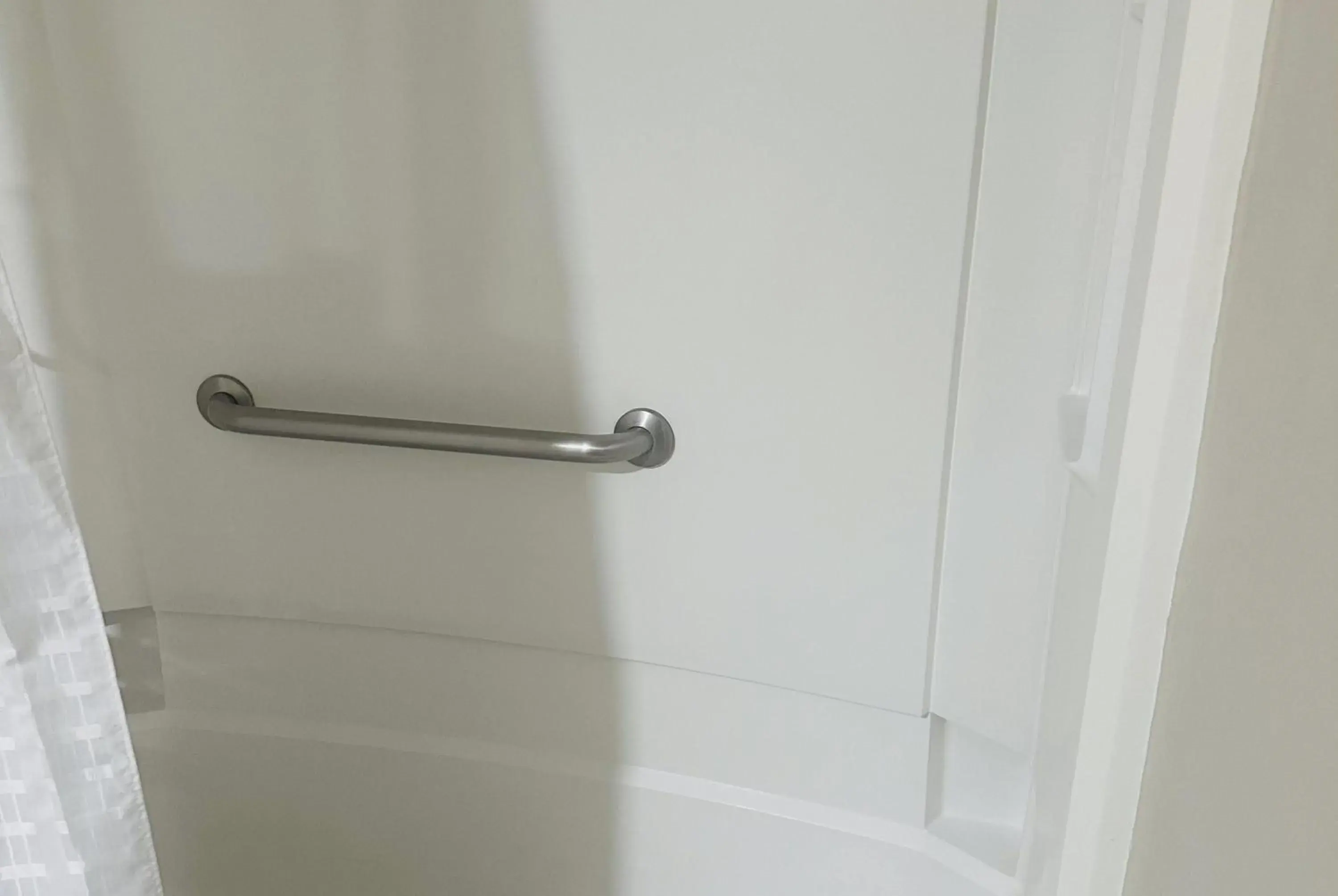 Bathroom in Super 8 by Wyndham Bossier City/Shreveport Area Bathroom in Super 8 by Wyndham Bossier City/Shreveport Area