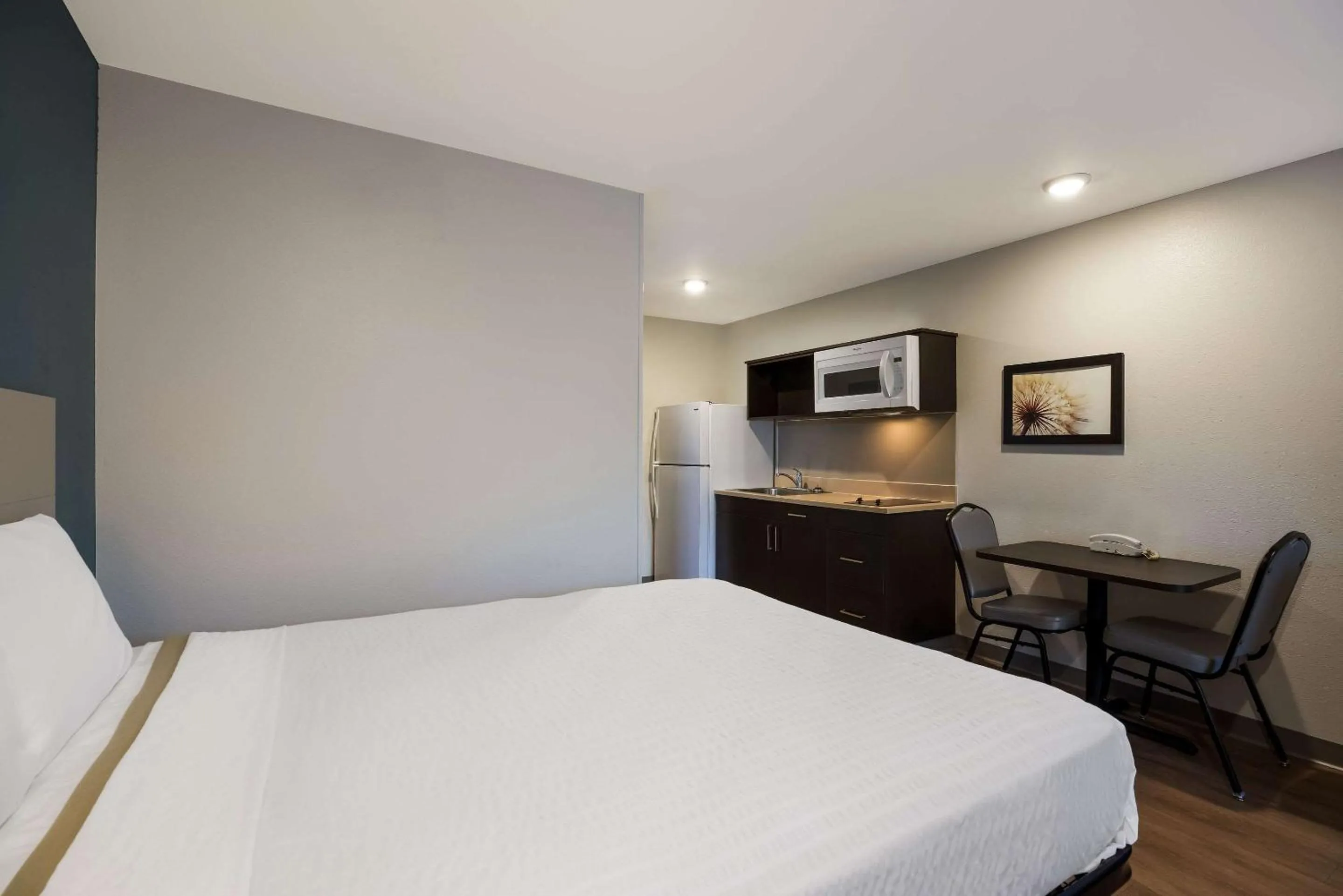 Bedroom, Bed in WoodSpring Suites Orlando North - Maitland