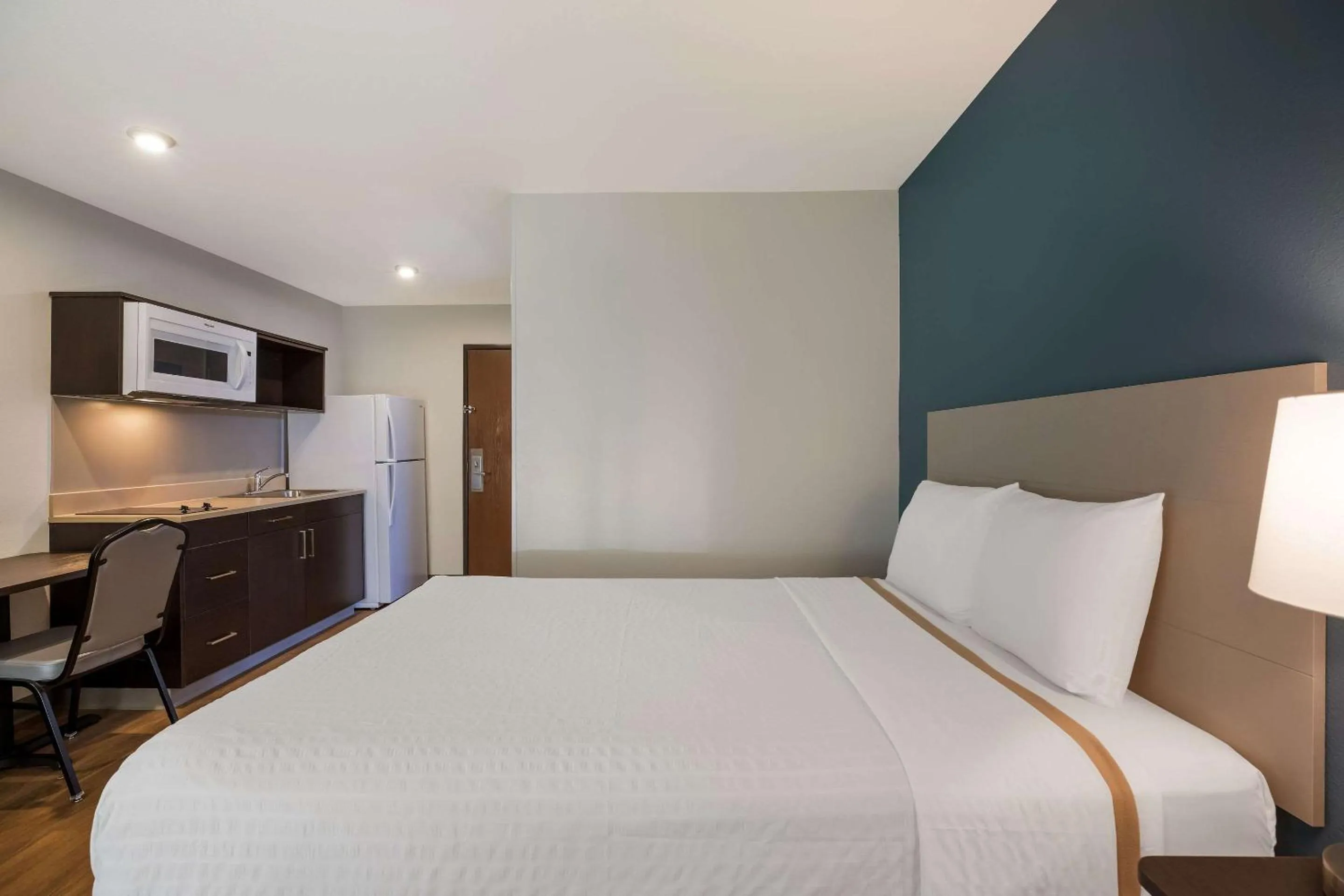 Bedroom, Bed in WoodSpring Suites Orlando North - Maitland