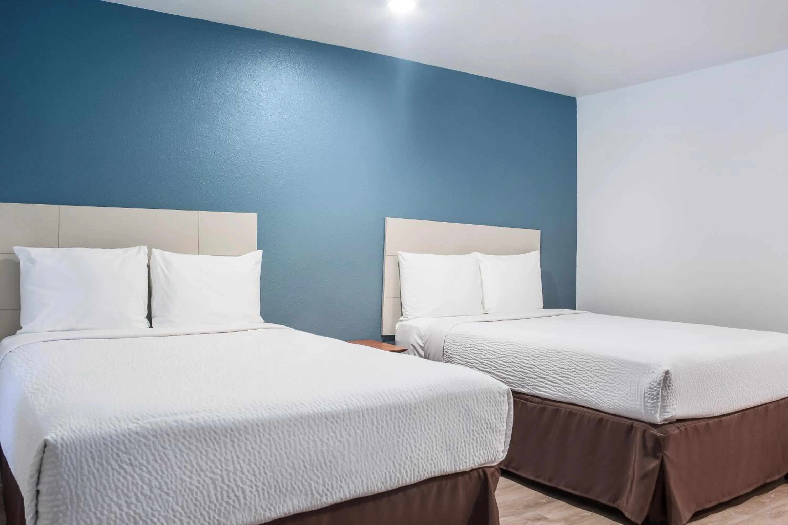 Bedroom, Bed in WoodSpring Suites Amarillo East I-40