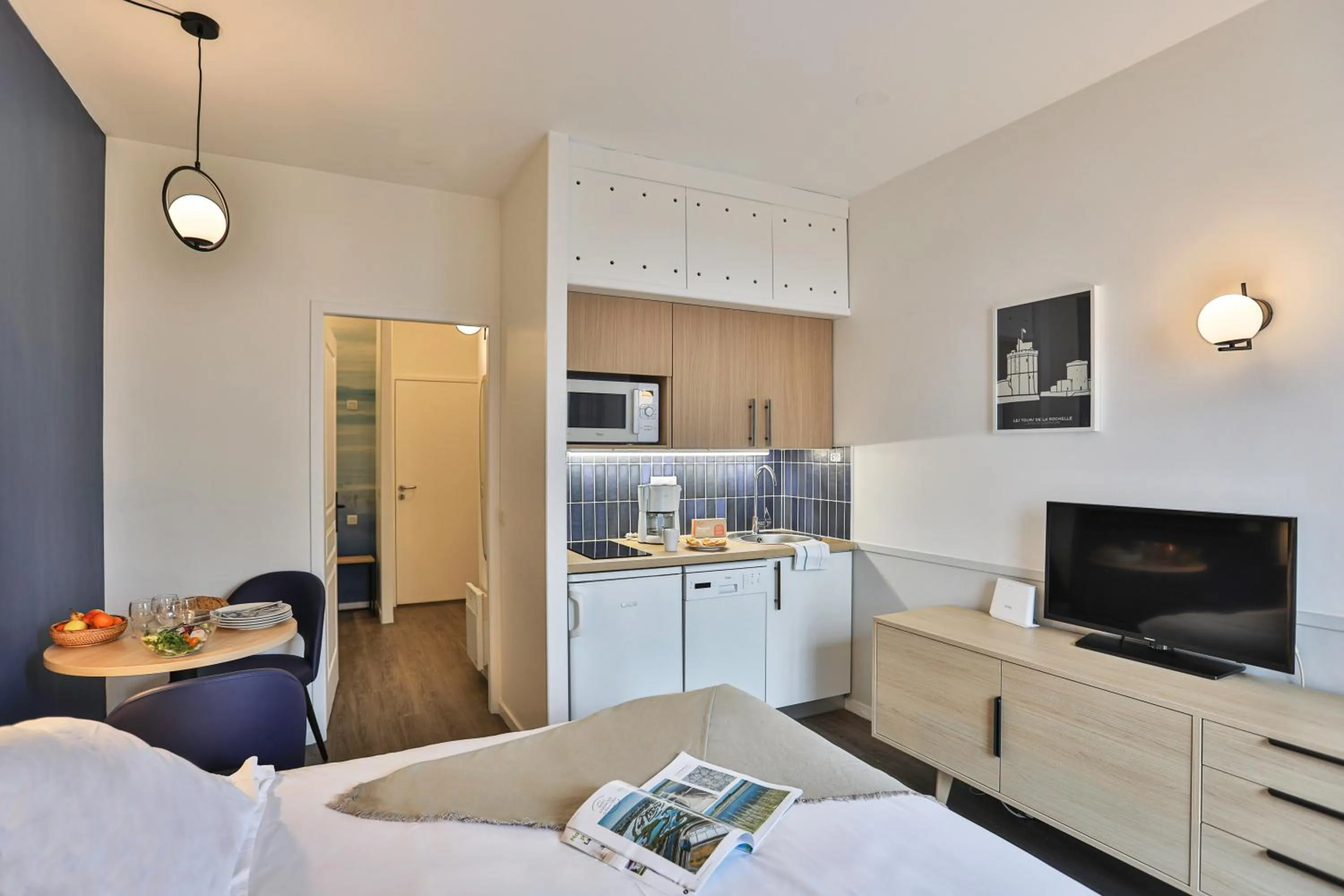 Communal lounge/ TV room, Bed in Résidence Pierre & Vacances Centre