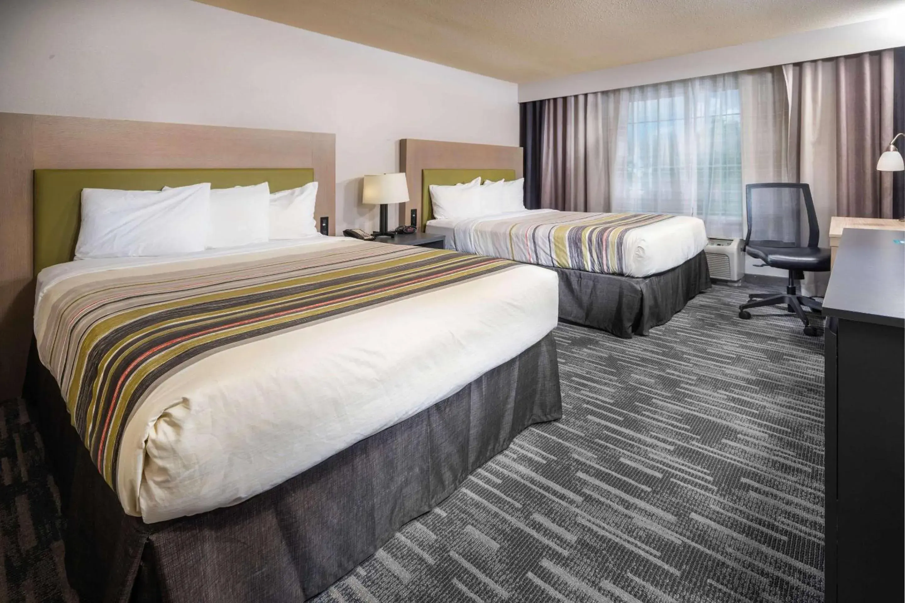 Bedroom, Bed in Country Inn & Suites by Radisson, Rocky Mount, NC Bedroom, Bed in Country Inn & Suites by Radisson, Rocky Mount, NC